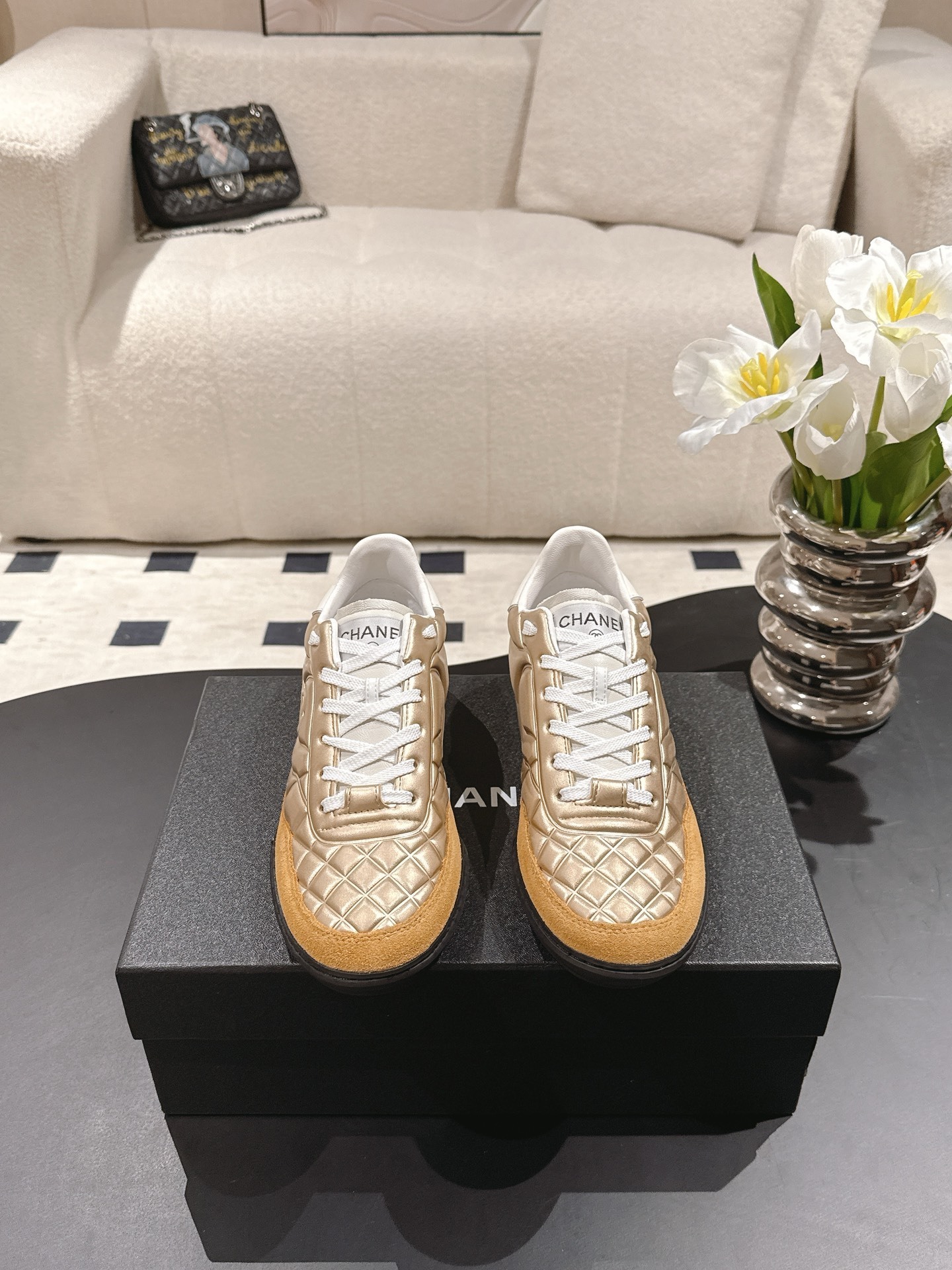 Luxury Chanel Gold Quilted Metallic Sneakers with Suede Accents