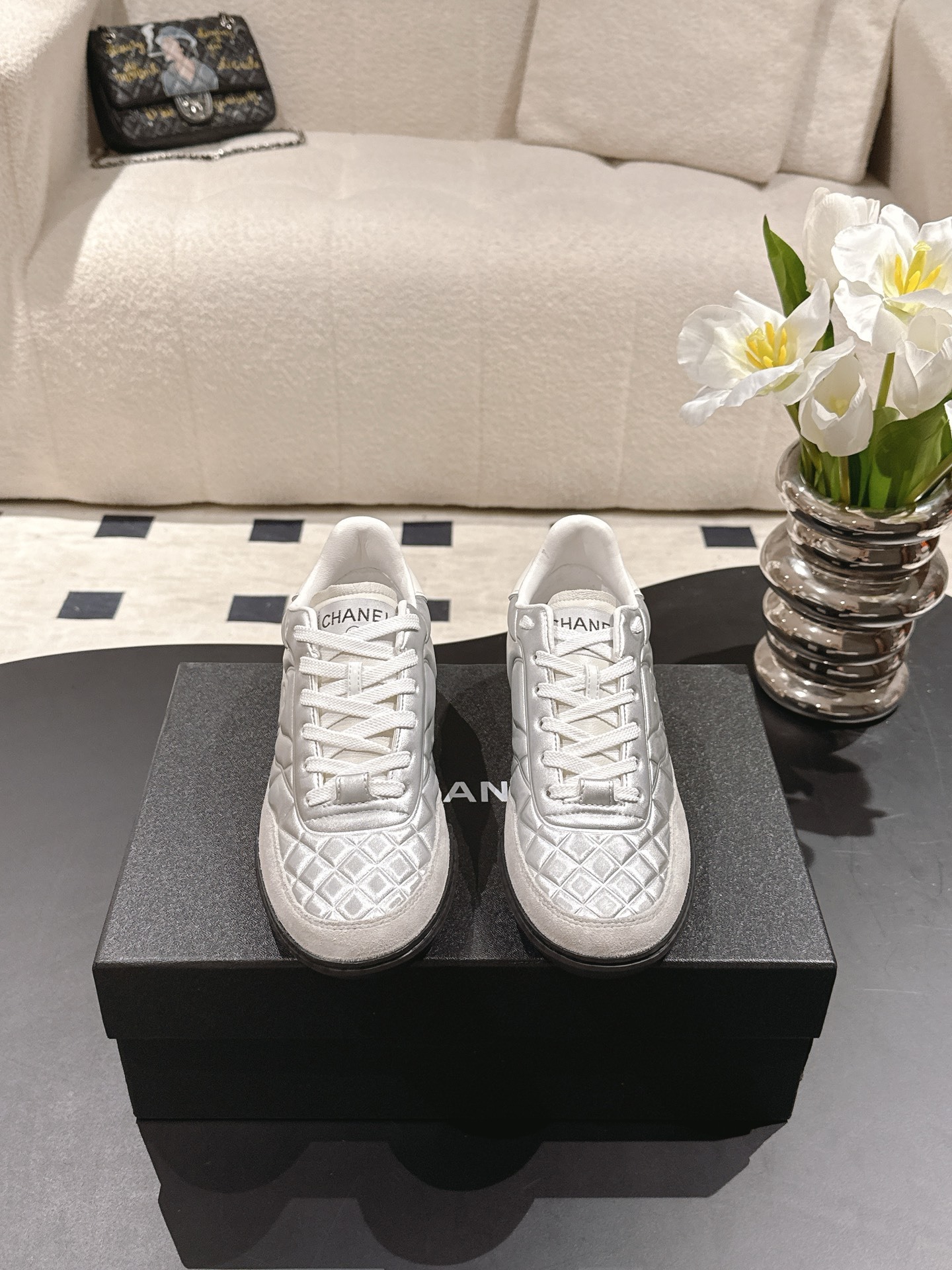 Chanel Women’s Quilted Leather Sneakers – Silver & White Luxury