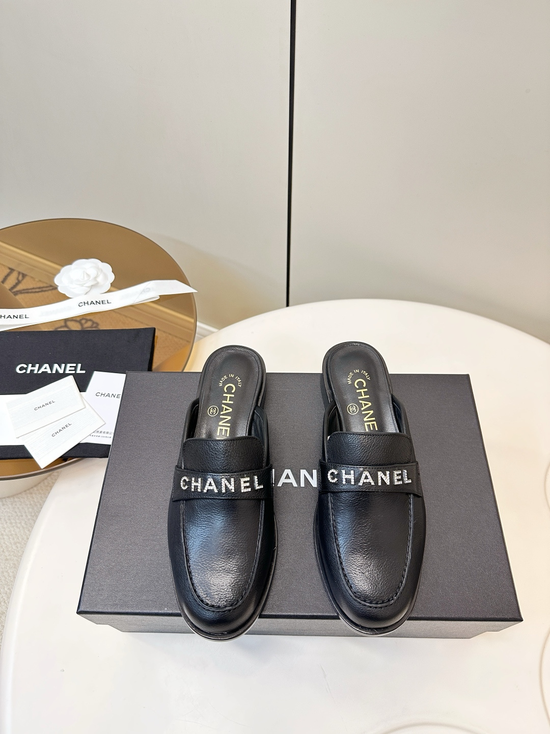 Chanel Black Leather Mules with Crystal Logo Loafers