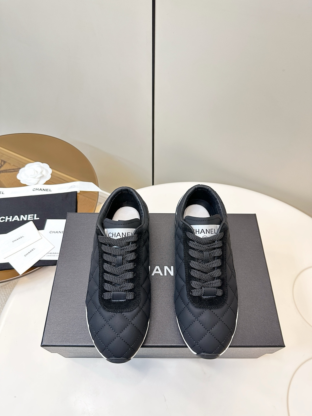 Chanel Quilted Fabric & Suede Sneakers – Black and White Luxury