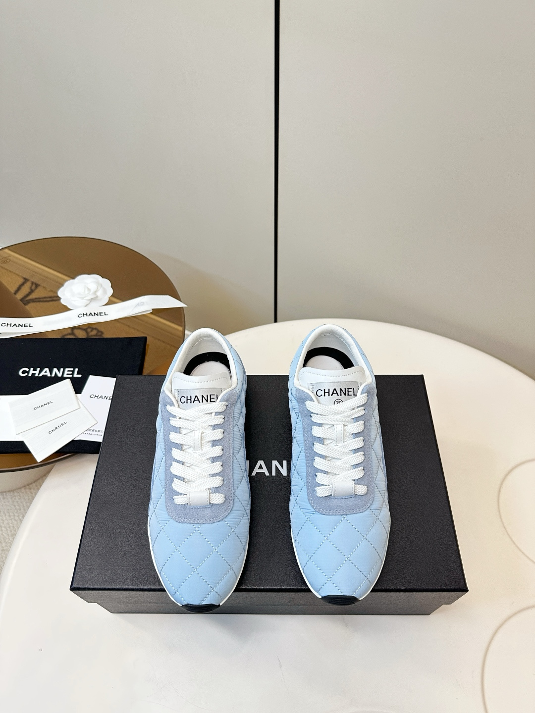 Chanel Light Blue Quilted Fabric and Suede Low-Top Sneakers