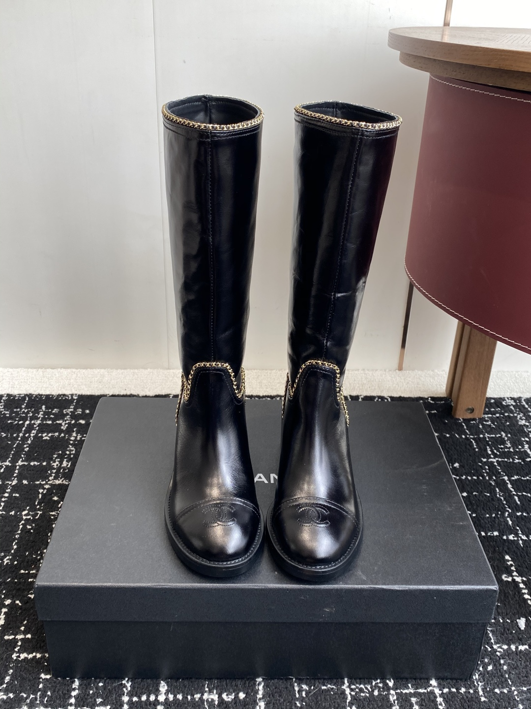 Chanel Black Leather Knee High Boots with Gold Chain Detail