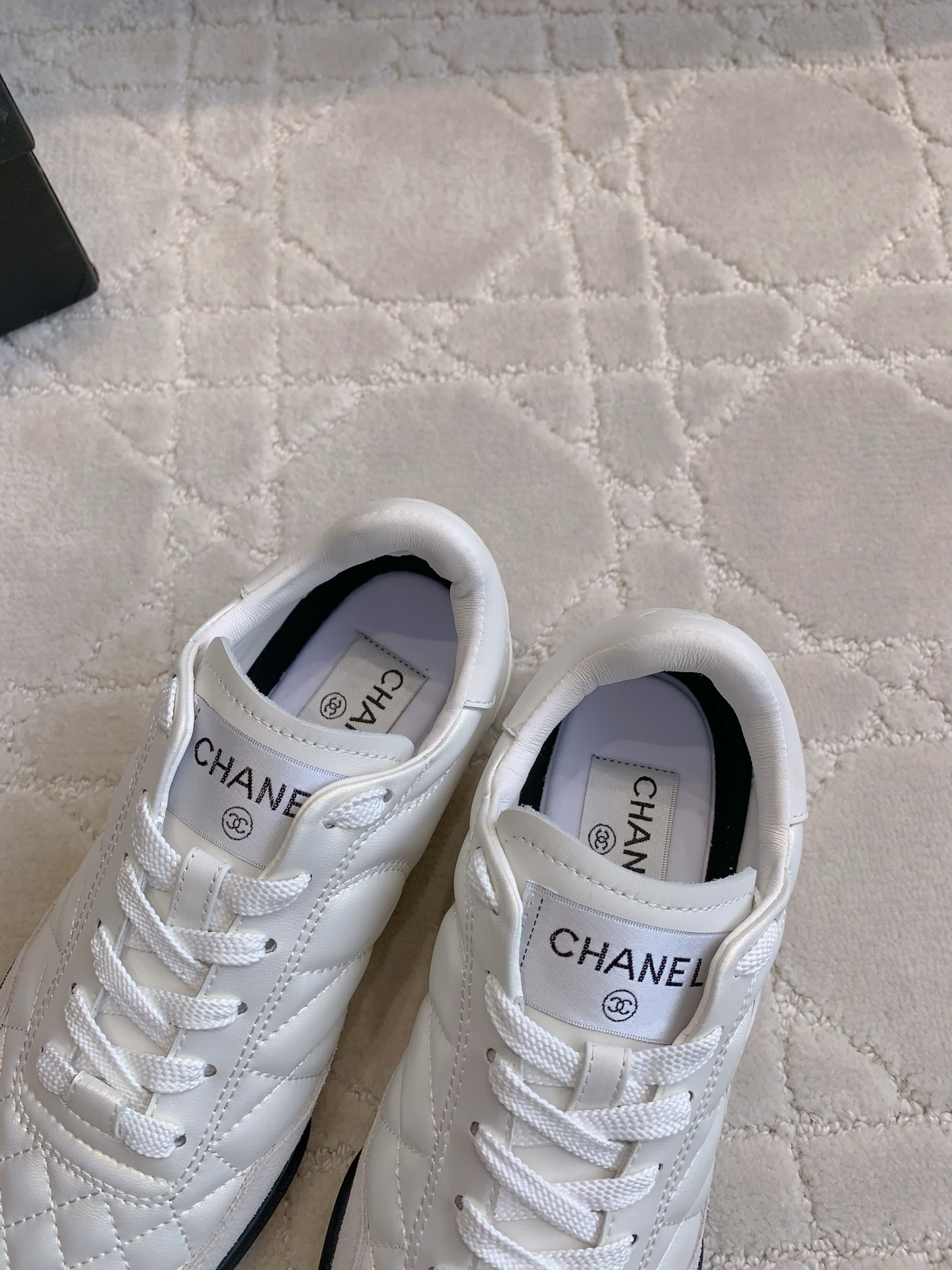 Chanel White Quilted Leather Sneakers - Luxury Designer Footwear