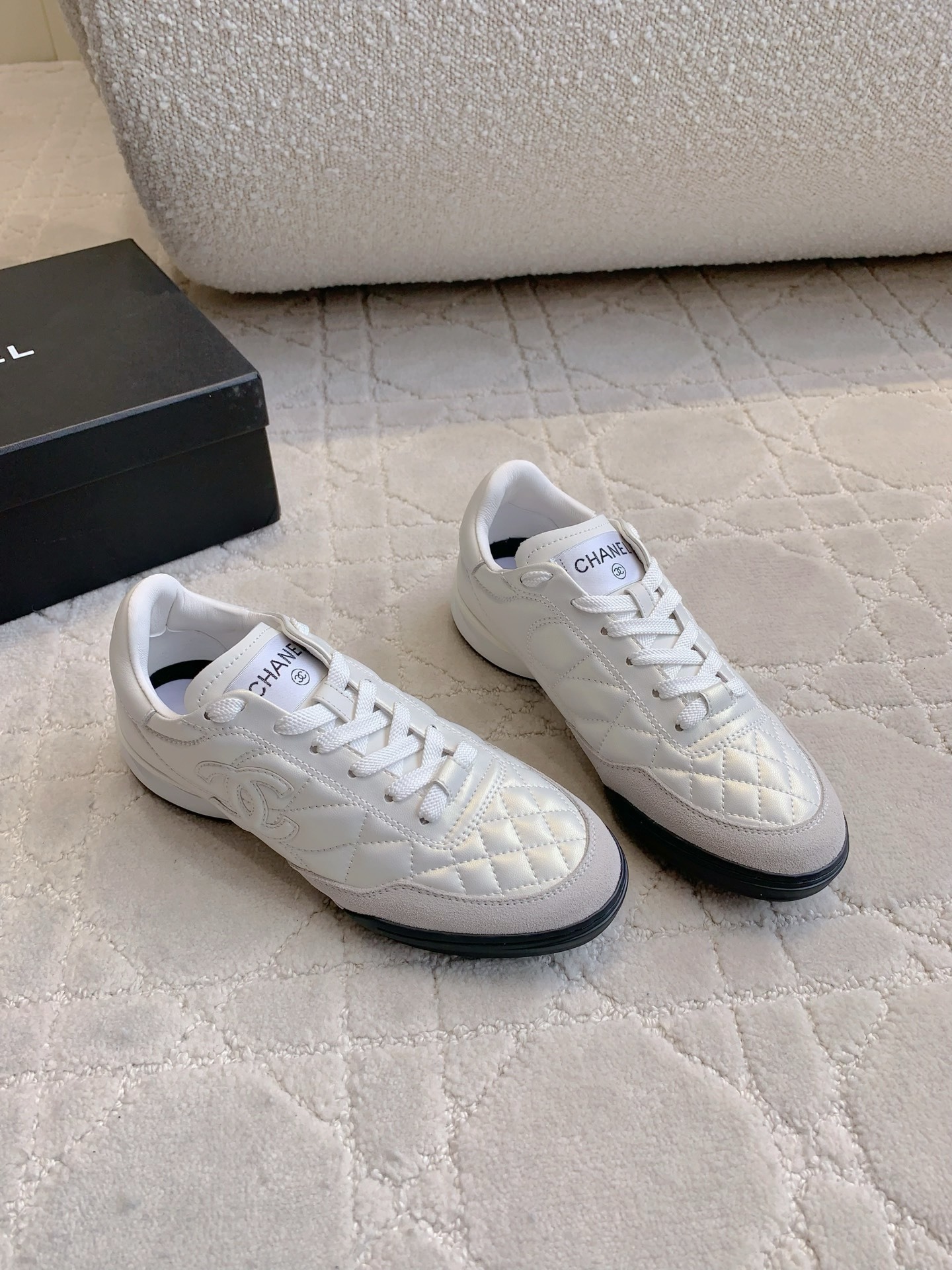 Chanel White Quilted Leather Sneakers - Luxury Designer Footwear