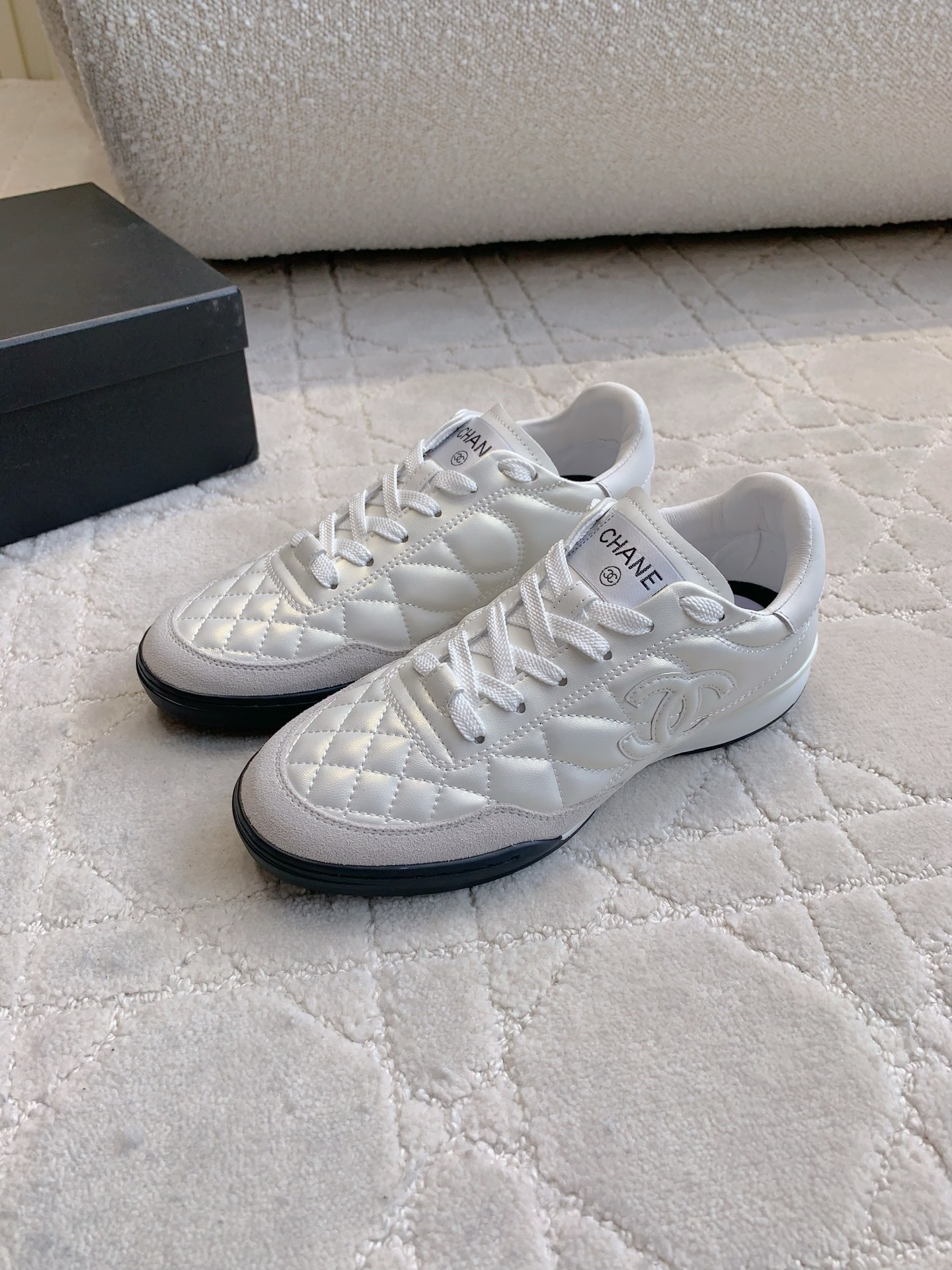 Chanel White Quilted Leather Sneakers - Luxury Designer Footwear