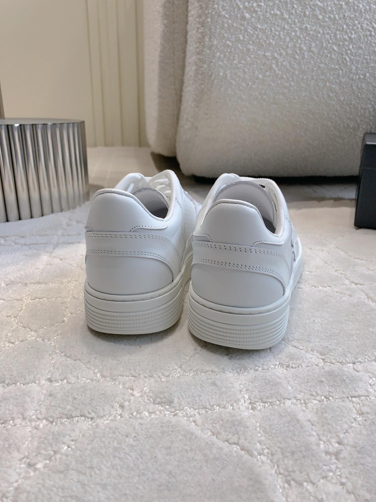 Pair of premium white Chanel calfskin leather sneakers with CC logo and perforated detailing. - Hình 8