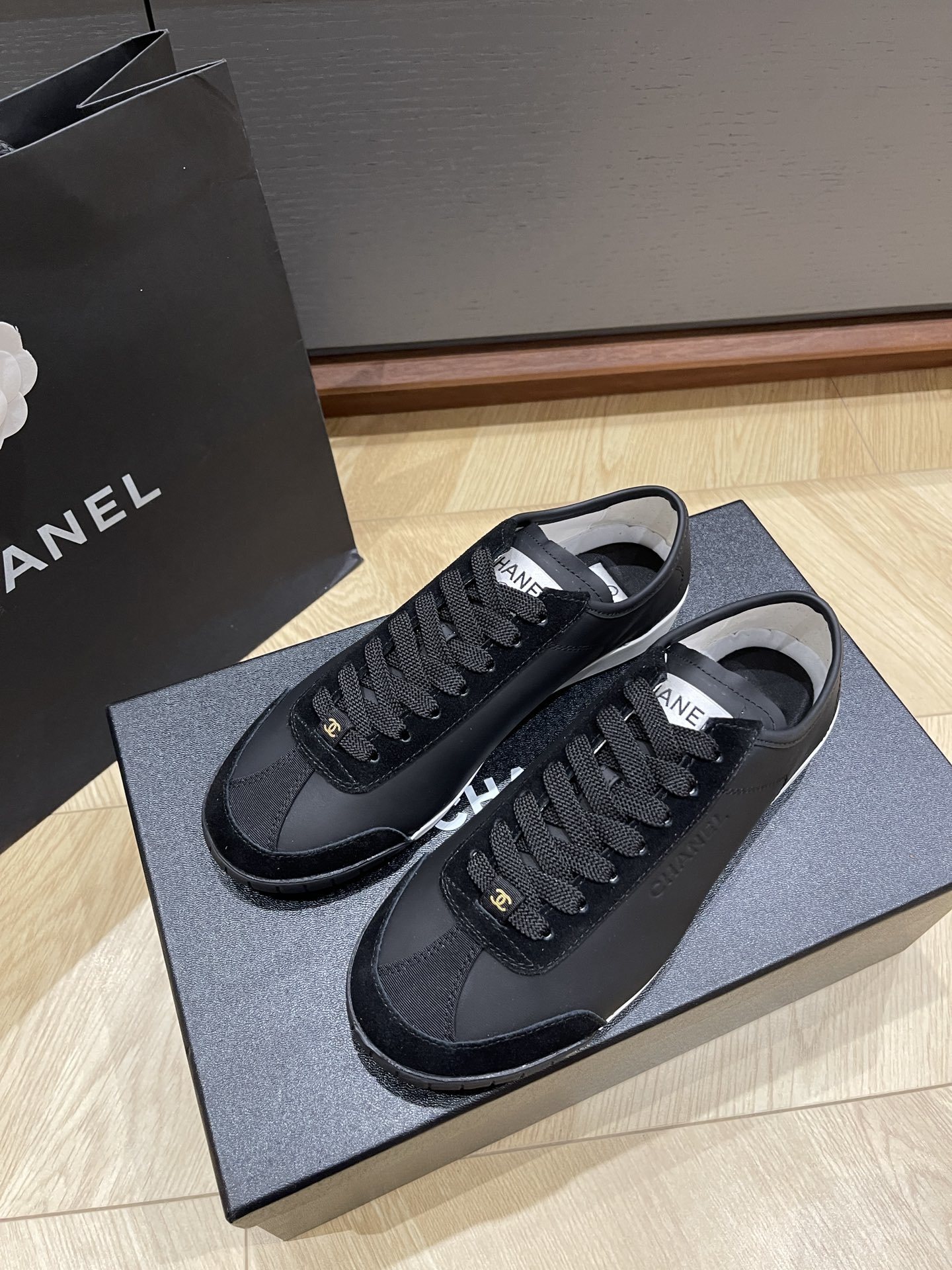 Chanel Black Leather & Suede Low-Top Sneakers – Luxury Fashion Shoes