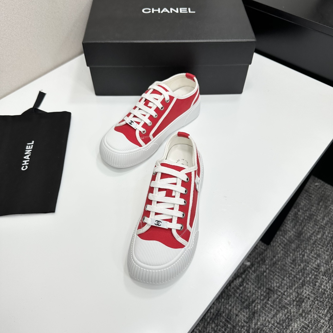 Pair of red canvas low-top sneakers with thick white platform soles and white laces - Hình 5