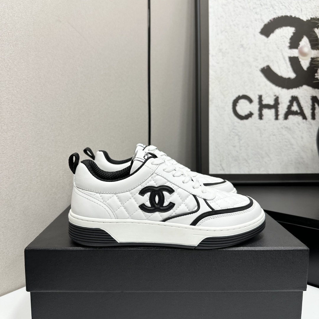 Chanel Quilted Leather Low-Top Sneakers – White and Black