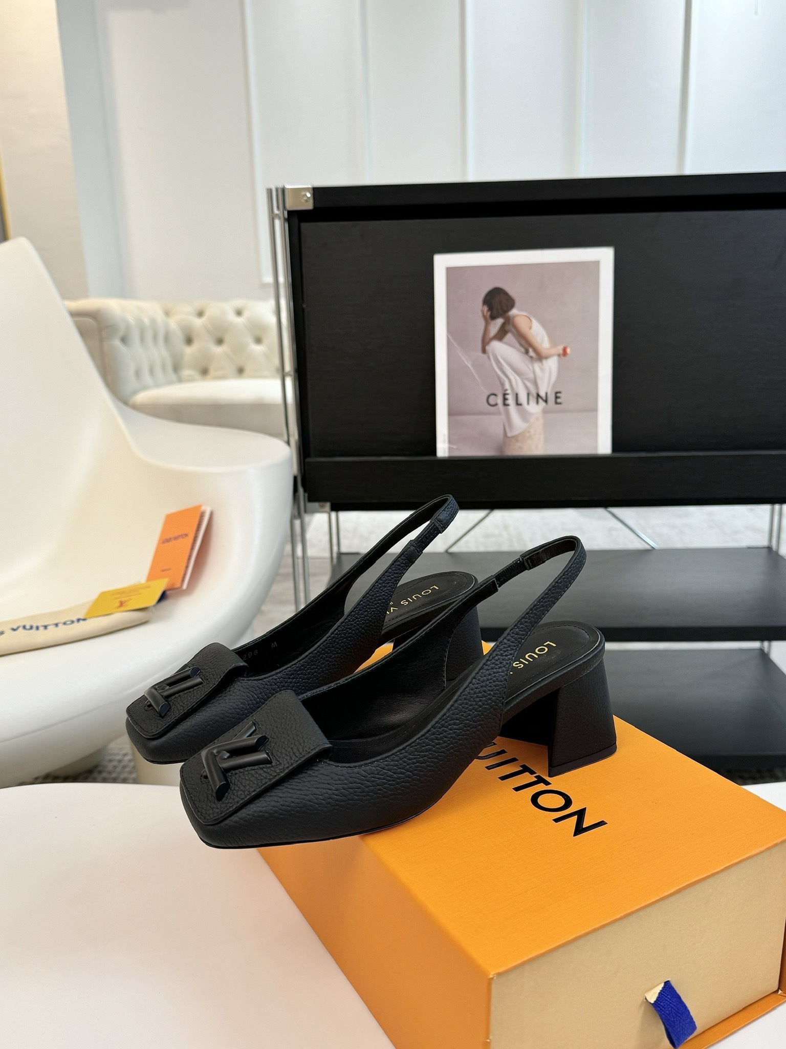 Louis Vuitton Black Grained Leather Slingback Pumps with LV Logo