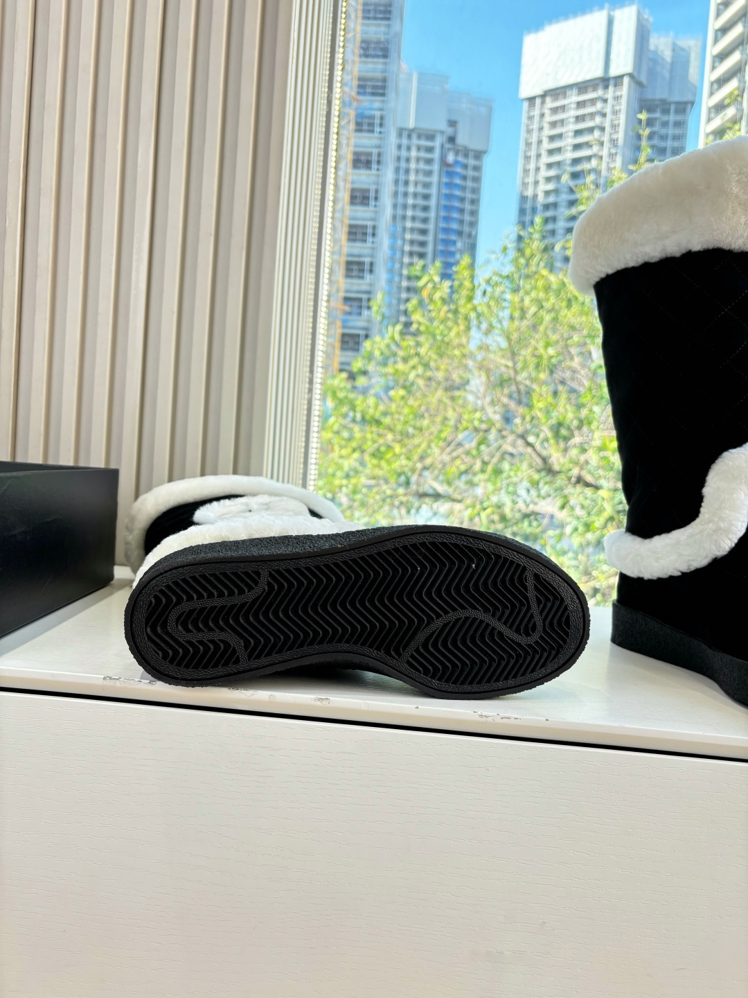 Black quilted mid-calf winter boots with white faux fur trim and a circular CC logo on the side. - Hình 9