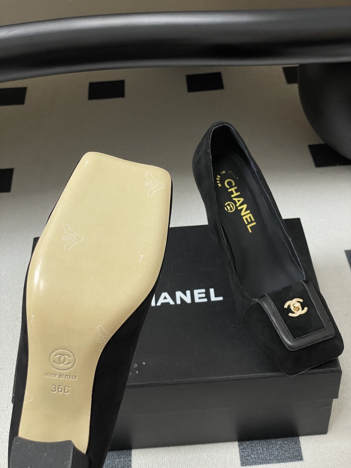 A pair of luxury Chanel black suede square-toe pumps featuring gold CC logo buckles and block heels. - Hình 8