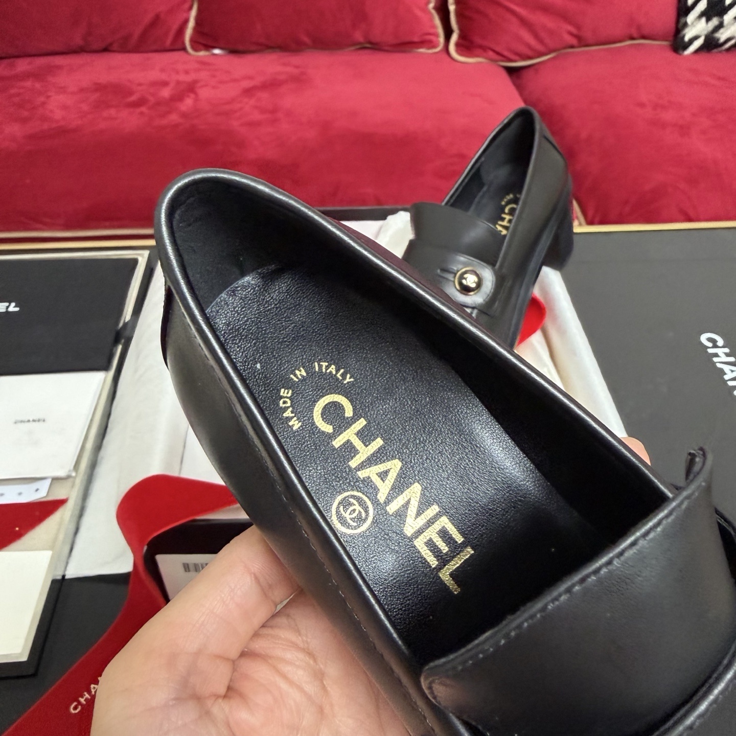 Authentic Chanel black leather loafers with block heels and gold CC logo buttons displayed in a box - Hình 7