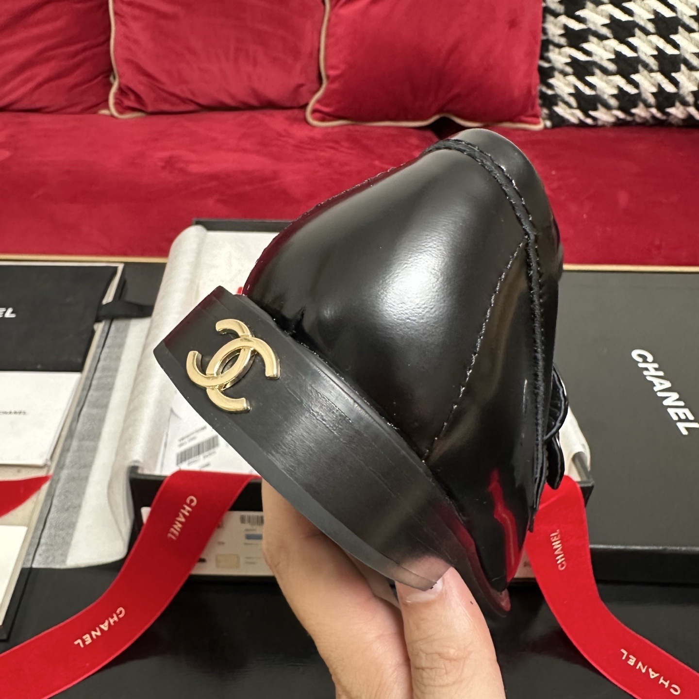 Pair of black Chanel leather loafers with gold CC buttons in original packaging with red ribbon - Hình 8