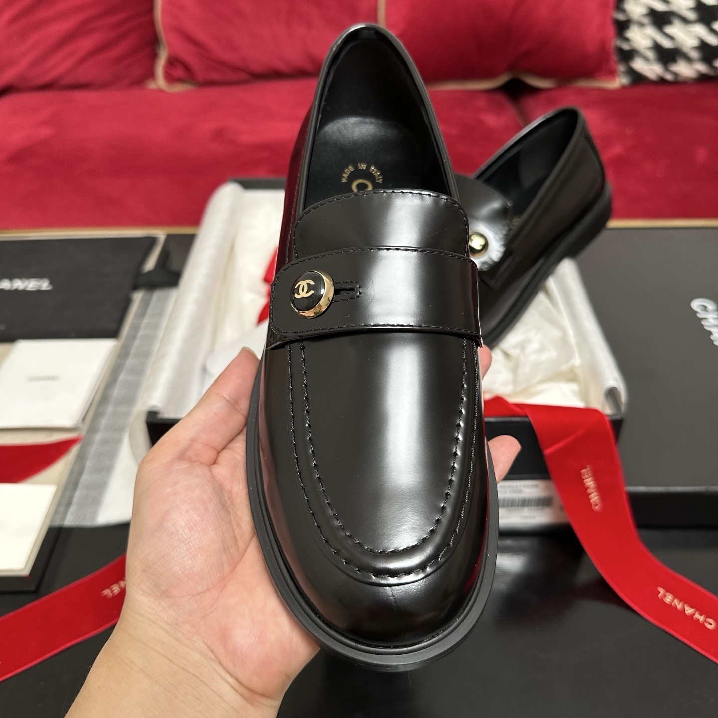 Pair of black Chanel leather loafers with gold CC buttons in original packaging with red ribbon - Hình 3