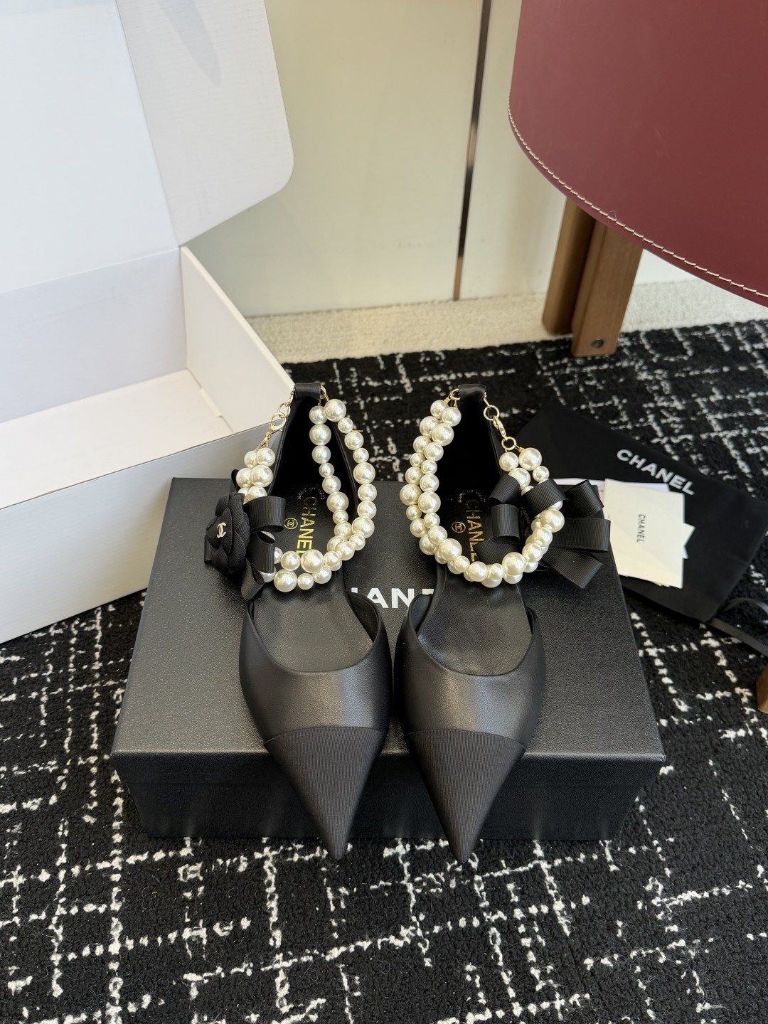 Luxury Black Pointed Toe Flats with Pearl Ankle Strap & Camellia