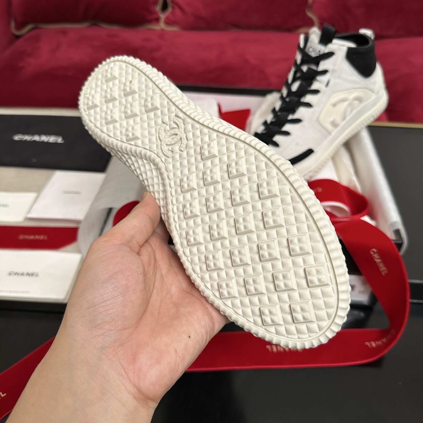 Pair of Chanel high-top sneakers in white and black suede with CC logo and original packaging. - Hình 9