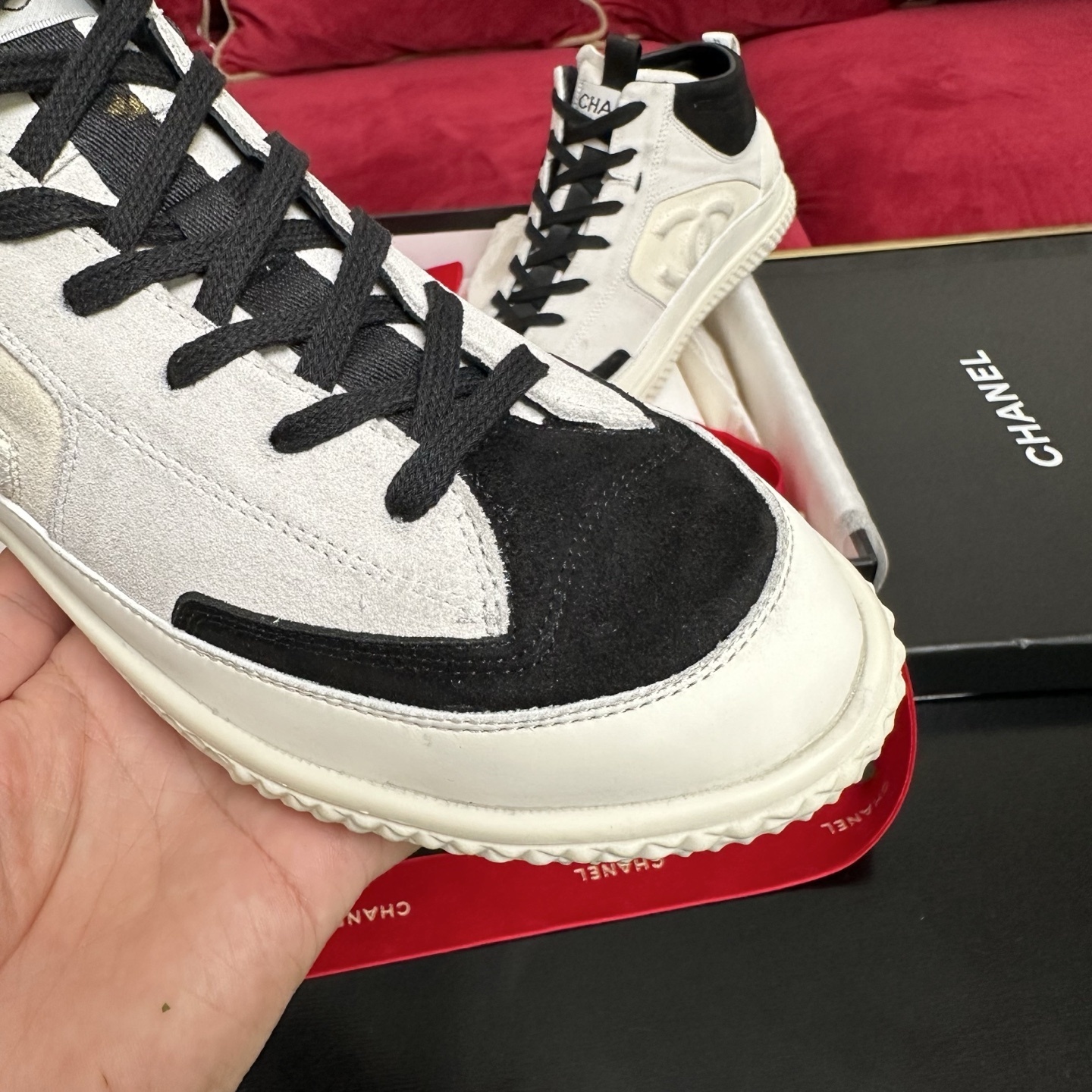 Pair of Chanel high-top sneakers in white and black suede with CC logo and original packaging. - Hình 6