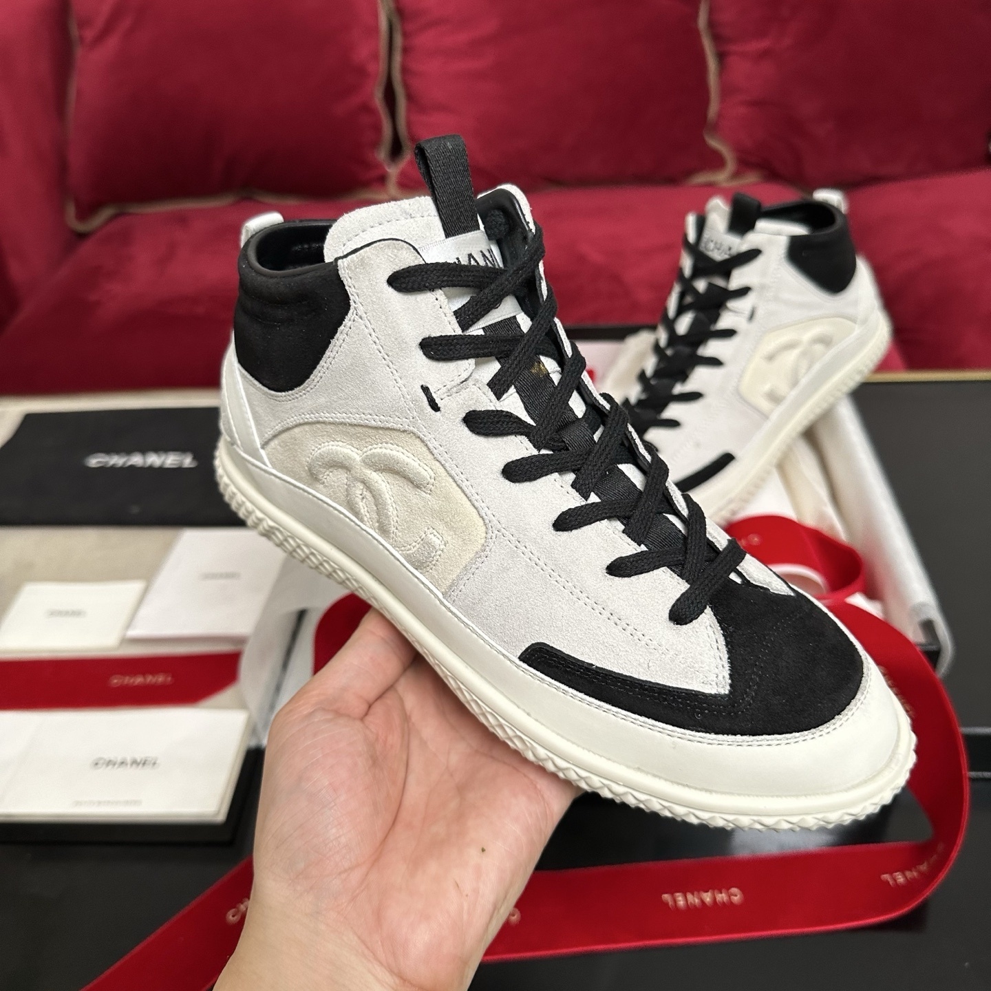 Pair of Chanel high-top sneakers in white and black suede with CC logo and original packaging. - Hình 4
