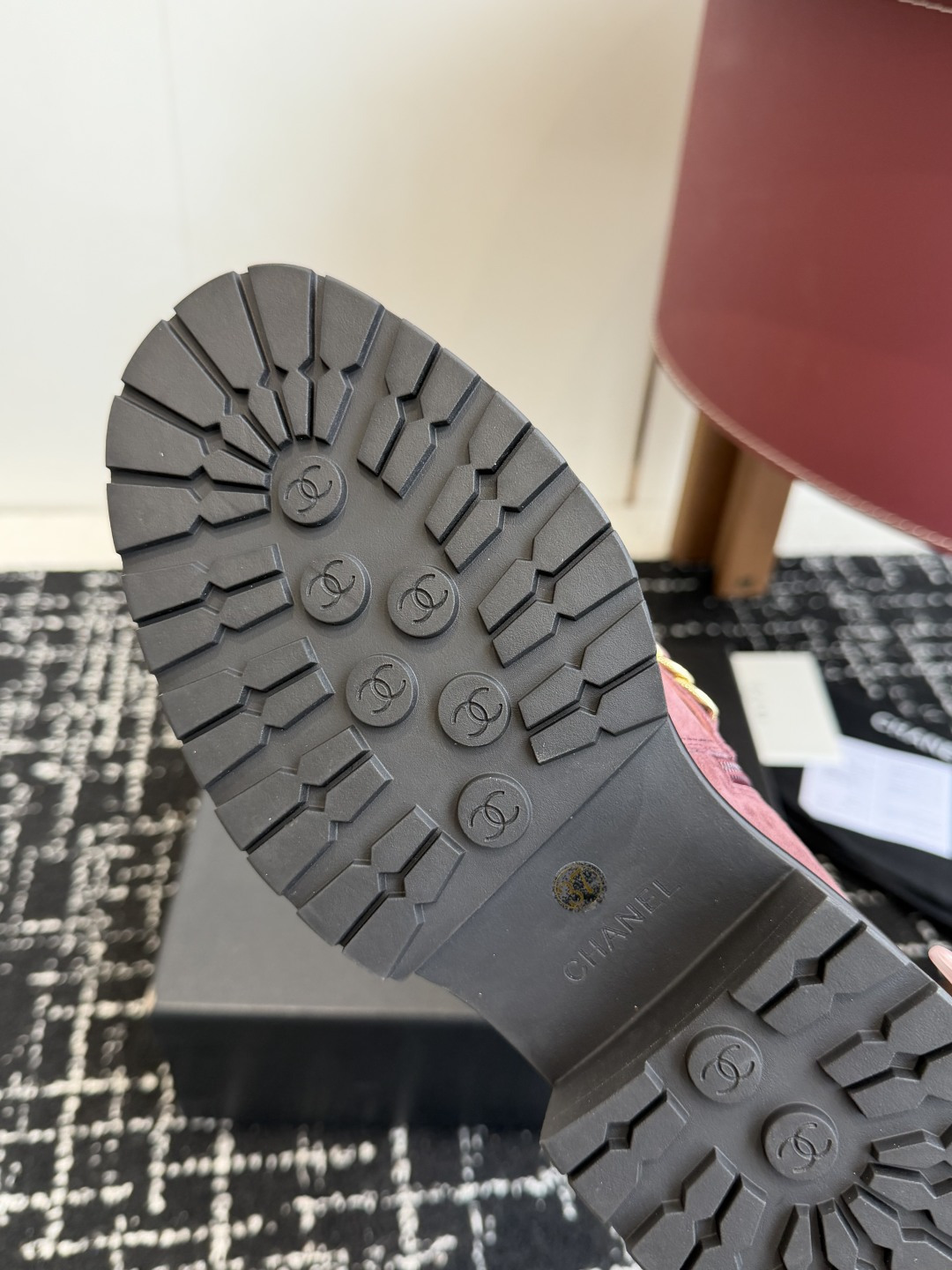 Luxury Chanel burgundy quilted suede ankle boots with black patent toe cap and decorative gold chain - Hình 9