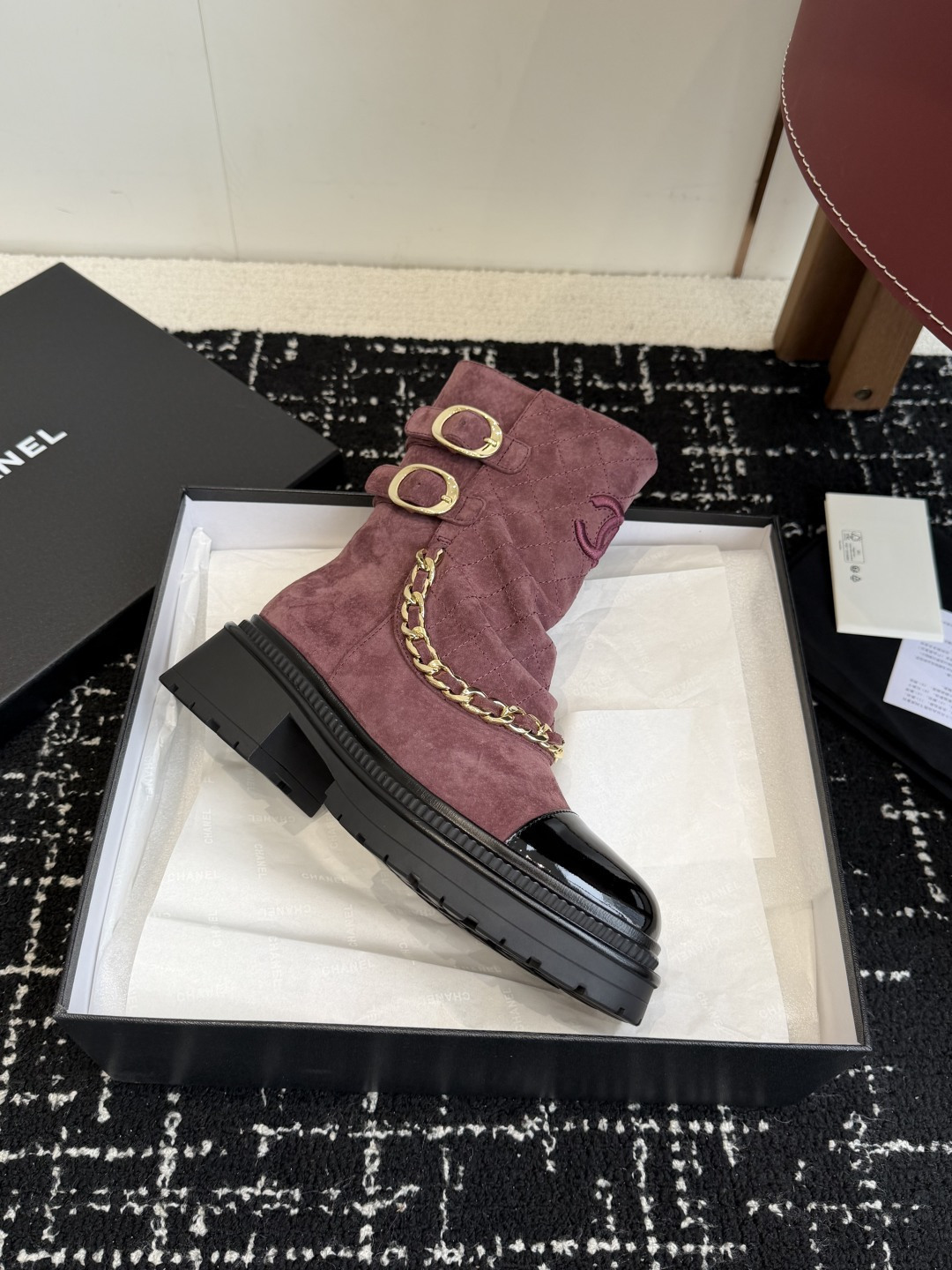 Luxury Chanel burgundy quilted suede ankle boots with black patent toe cap and decorative gold chain - Hình 6