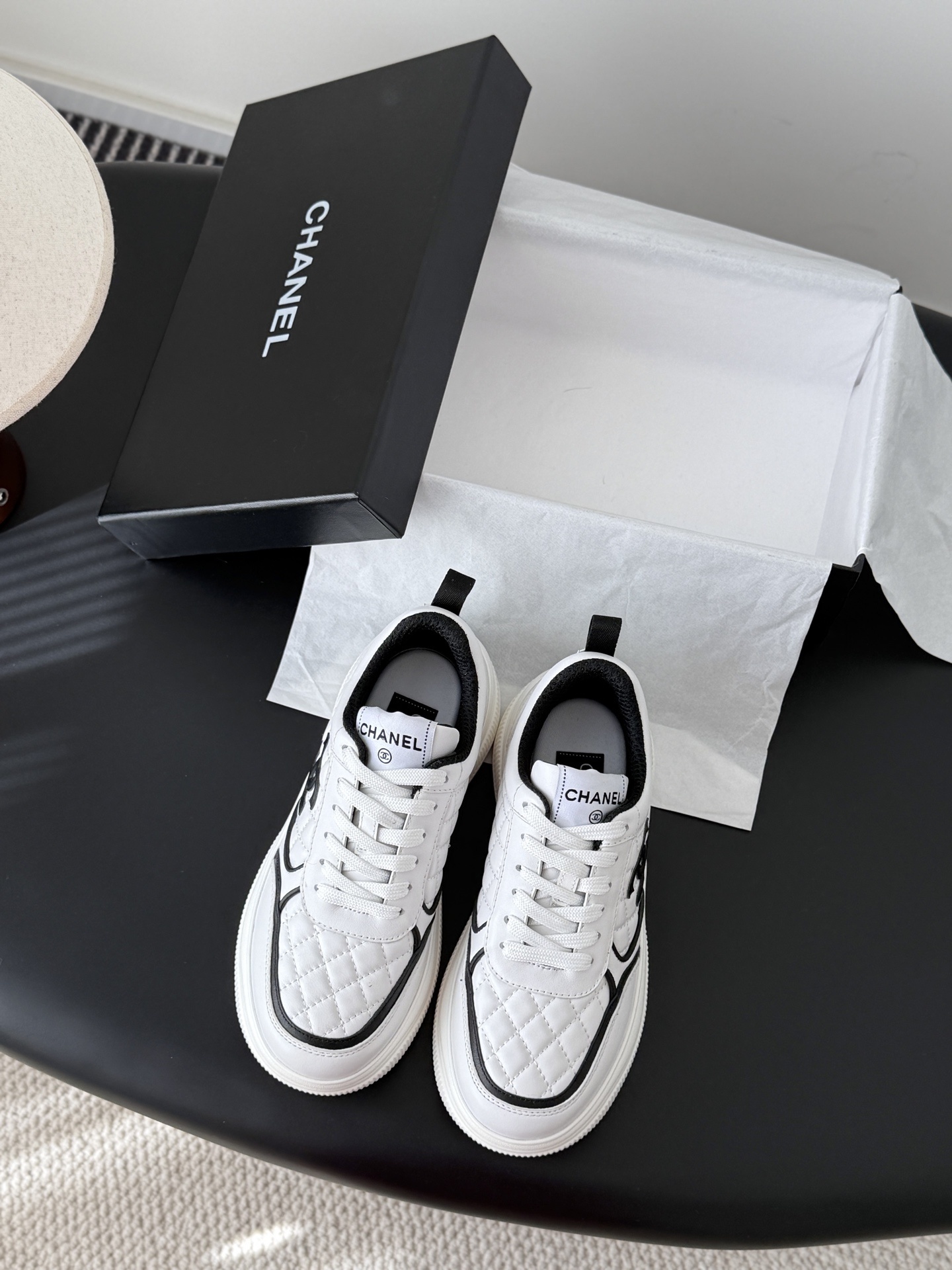 Chanel White Quilted Leather Sneakers – Elegant Designer Footwear