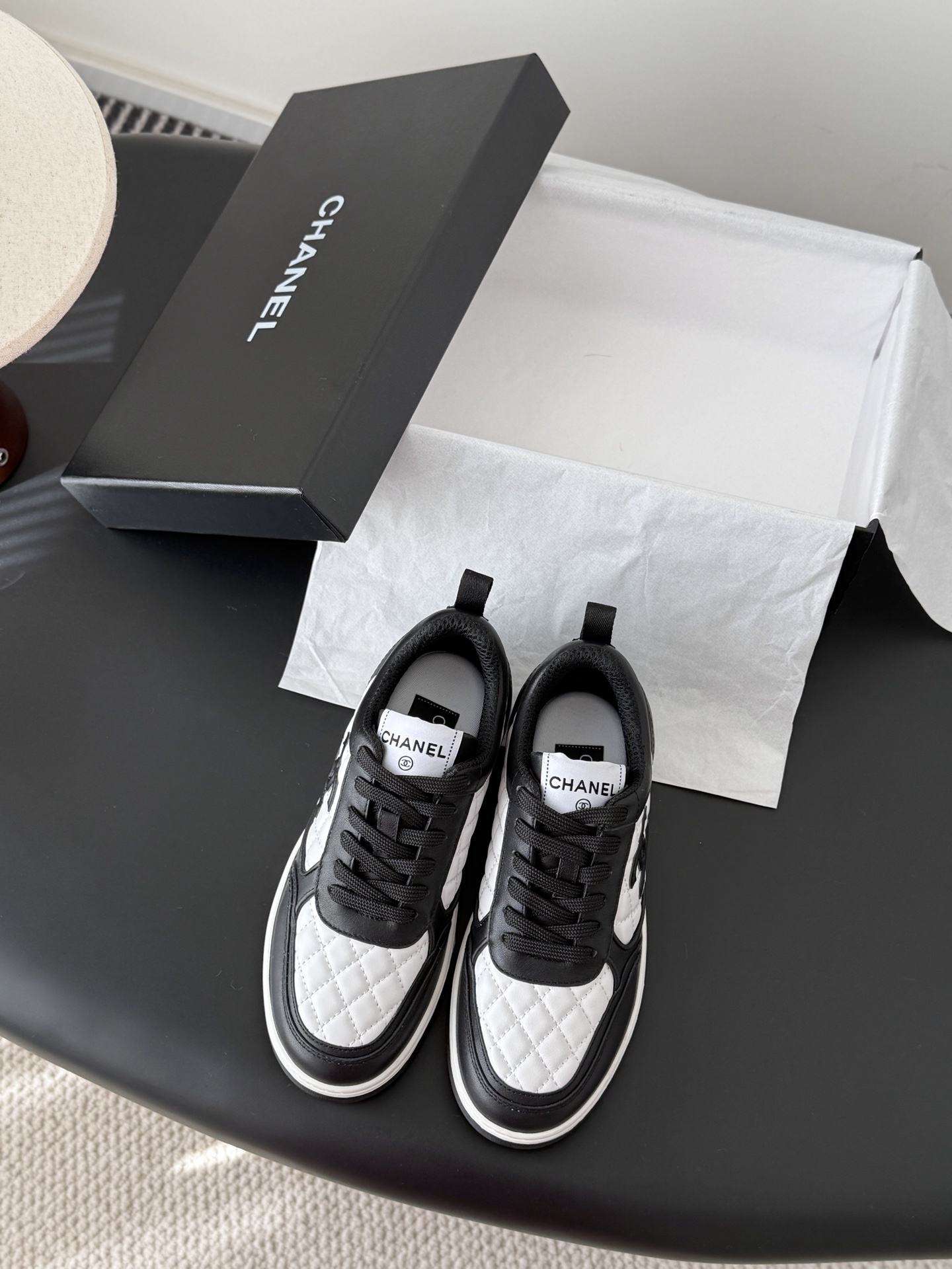 Luxury Chanel Quilted Leather Sneakers – Black & White Low Top