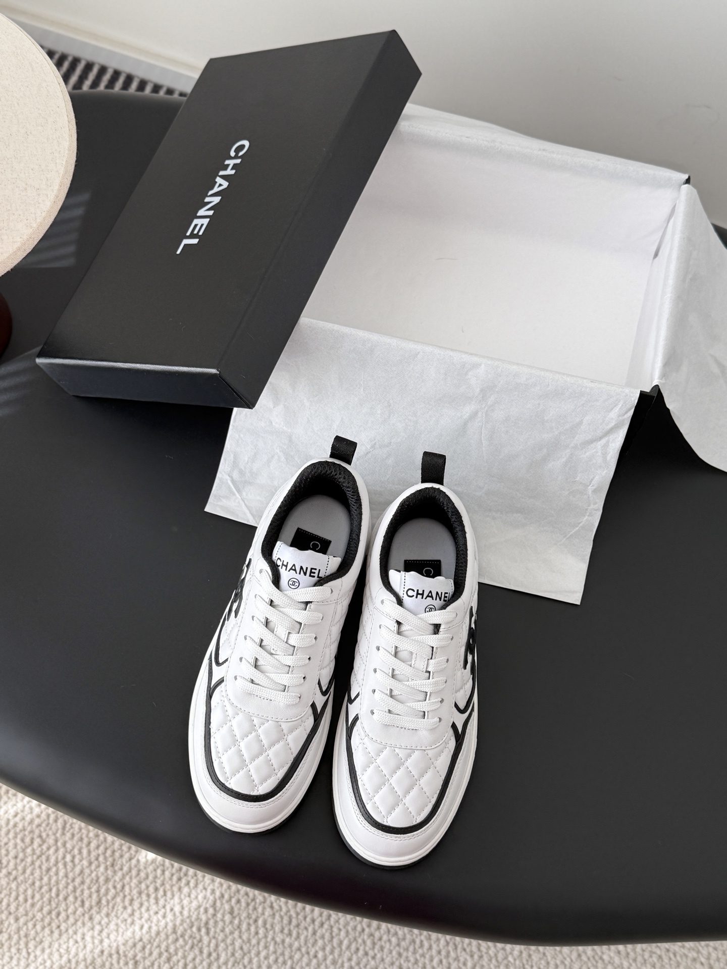 Chanel Quilted White & Black Leather Sneakers – Luxury Fashion Shoes