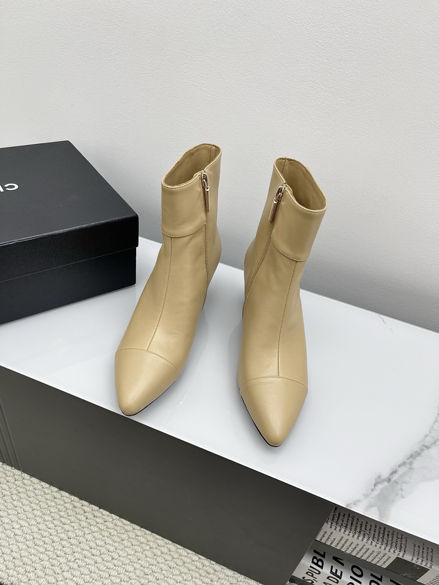 Chanel Beige Leather Ankle Boots with Gold Lion Head Detail