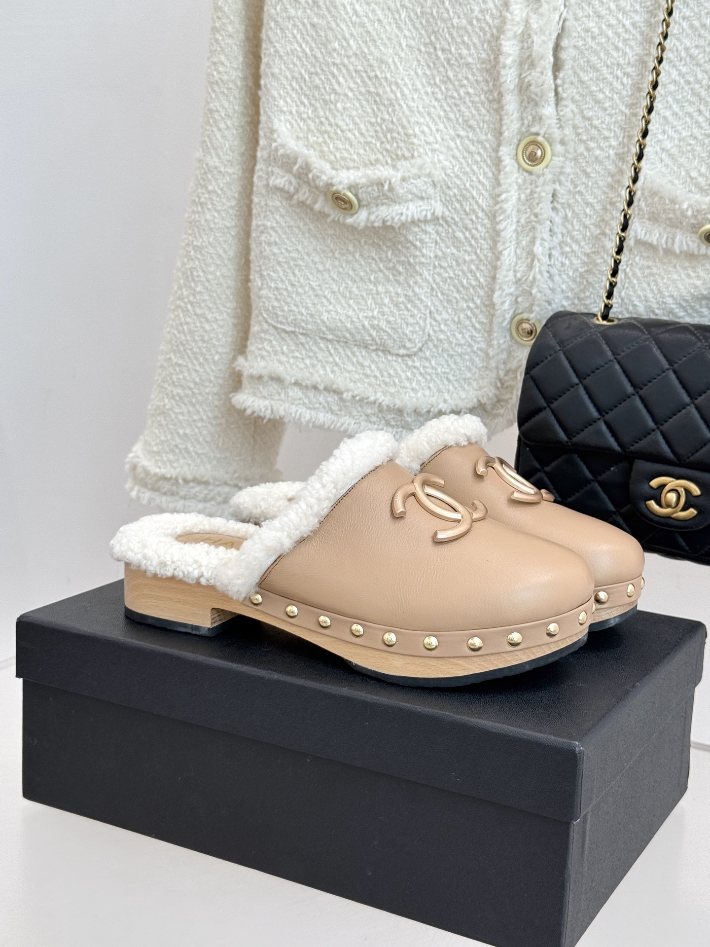 Chanel Beige Lambskin & Shearling Clogs – Gold Logo Studded Mules
