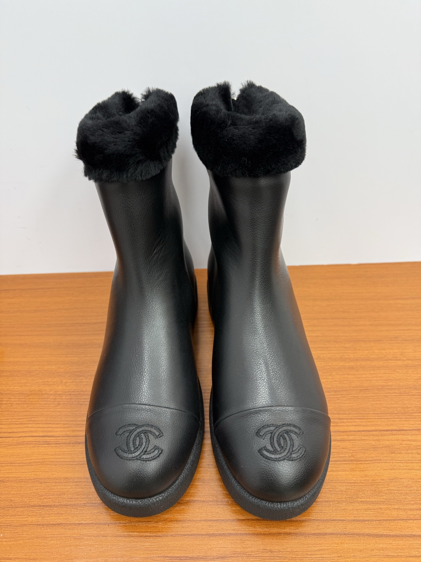 Chanel Black Leather Ankle Boots with Fur Trim and CC Logo