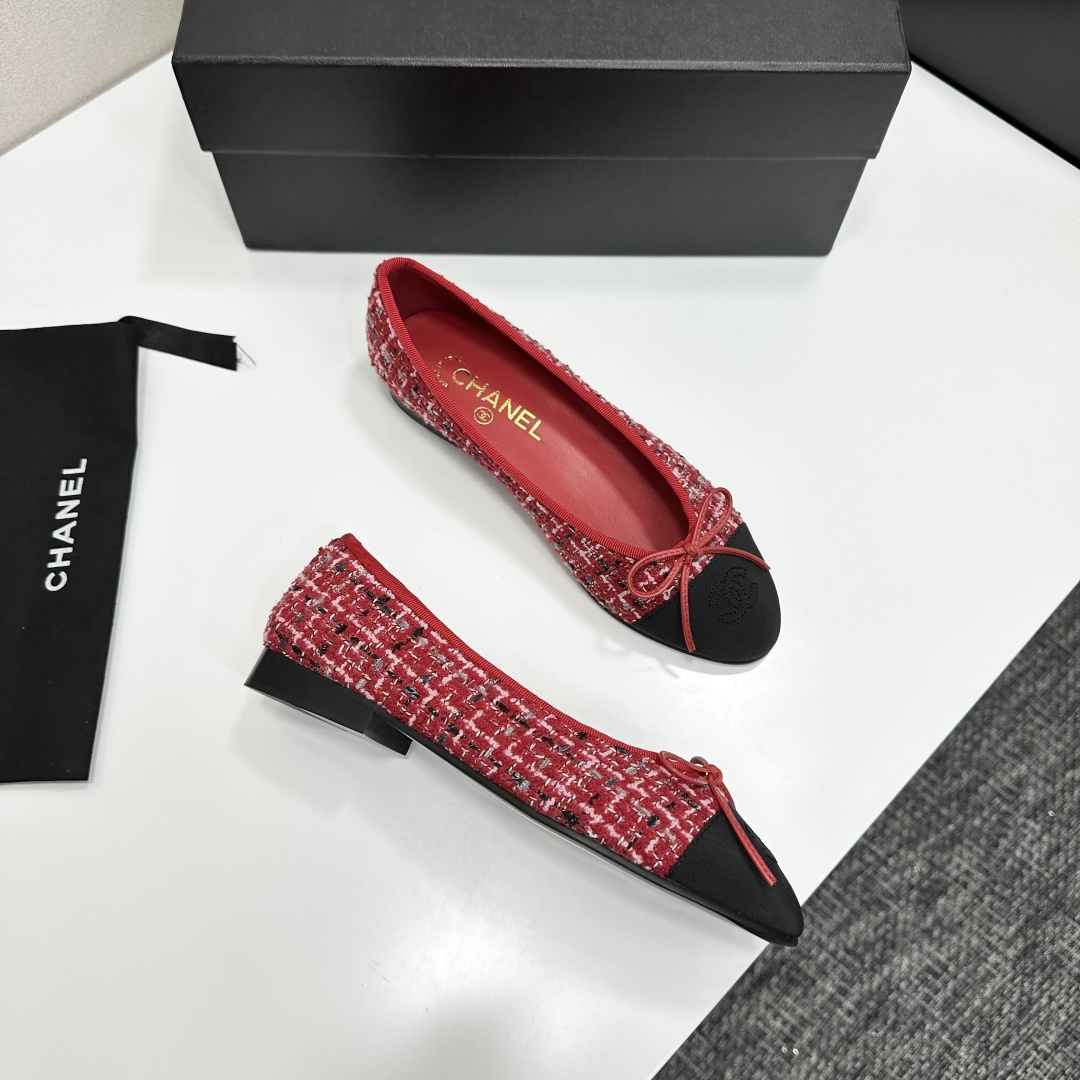 A pair of luxury Chanel ballet flats made of red tweed with black cap toes and CC logo on a black designer box - Hình 9
