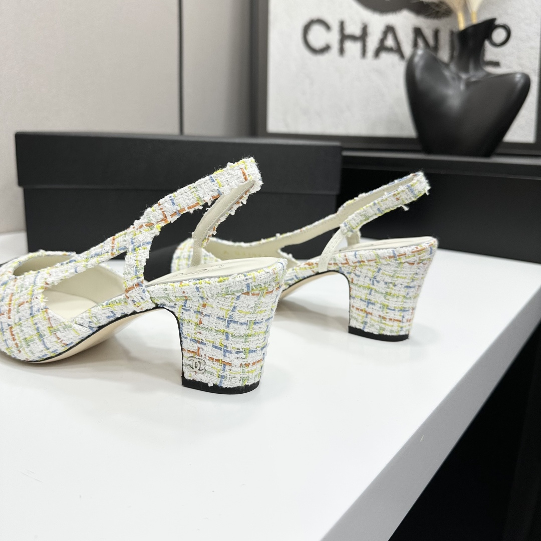 Pair of Chanel multi-color pastel tweed slingback pumps with black cap toe and block heel on a black box. - Hình 10