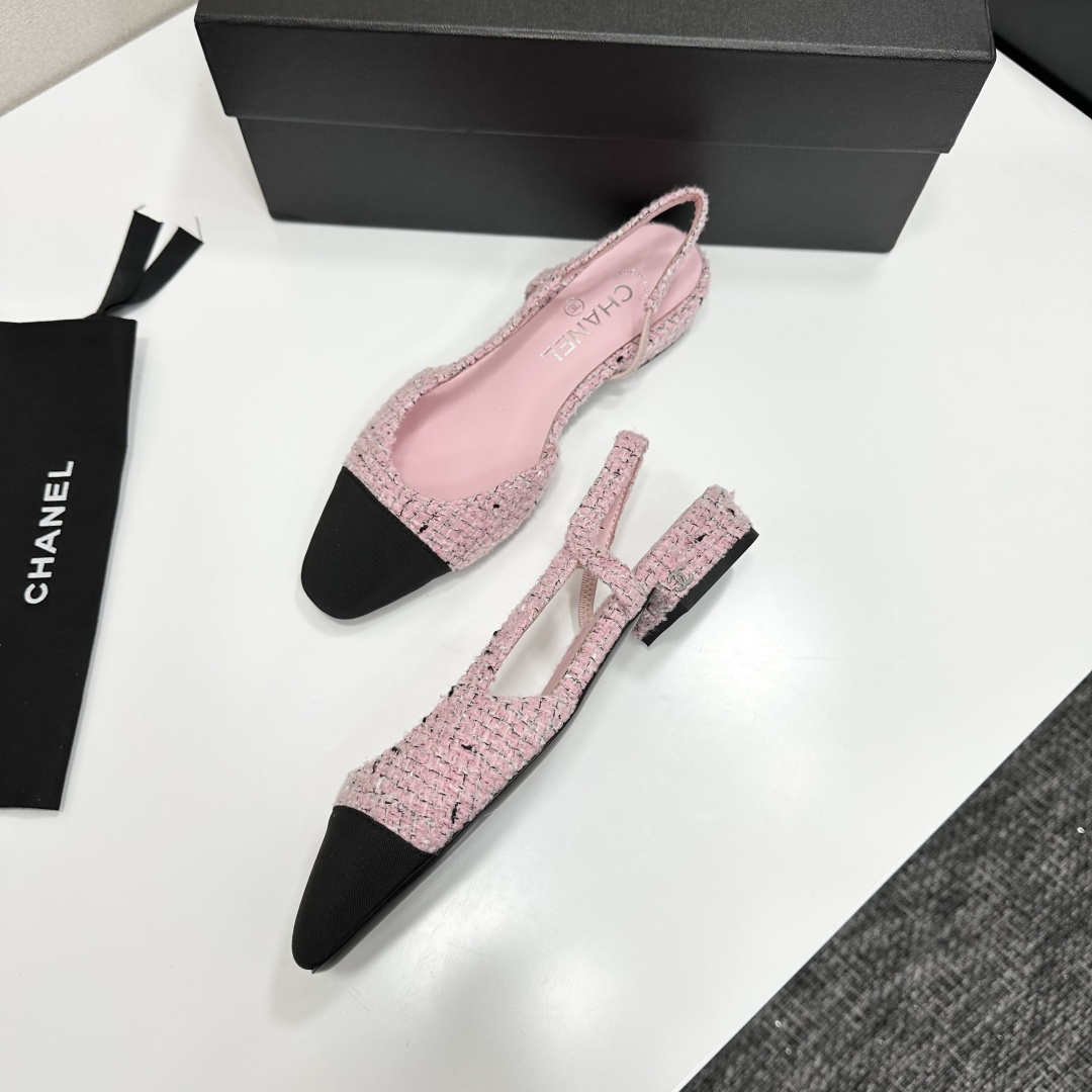 A pair of luxury pink tweed slingback flats with a black pointed toe and a low block heel featuring the Chanel logo. - Hình 9