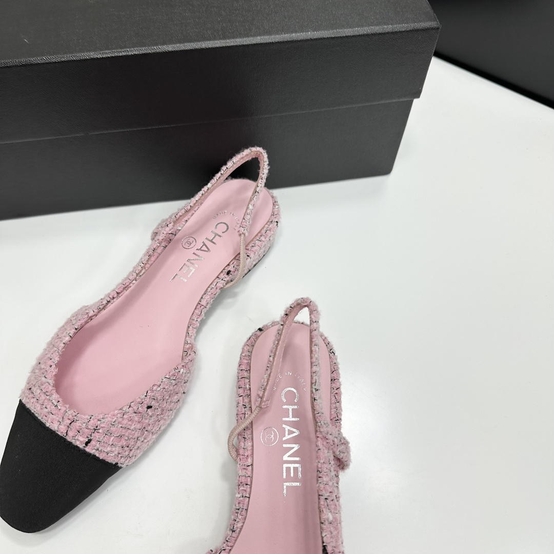 A pair of luxury pink tweed slingback flats with a black pointed toe and a low block heel featuring the Chanel logo. - Hình 8