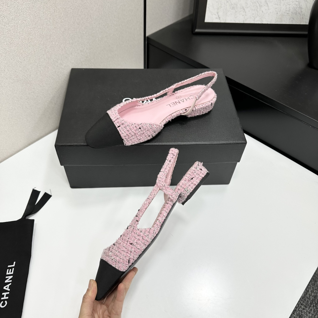 A pair of luxury pink tweed slingback flats with a black pointed toe and a low block heel featuring the Chanel logo. - Hình 5