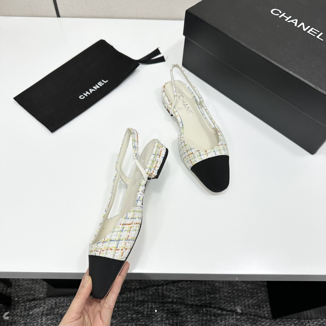 A pair of Chanel multi-colored tweed slingback flats with black cap toes and CC logo on the heel. - Hình 8