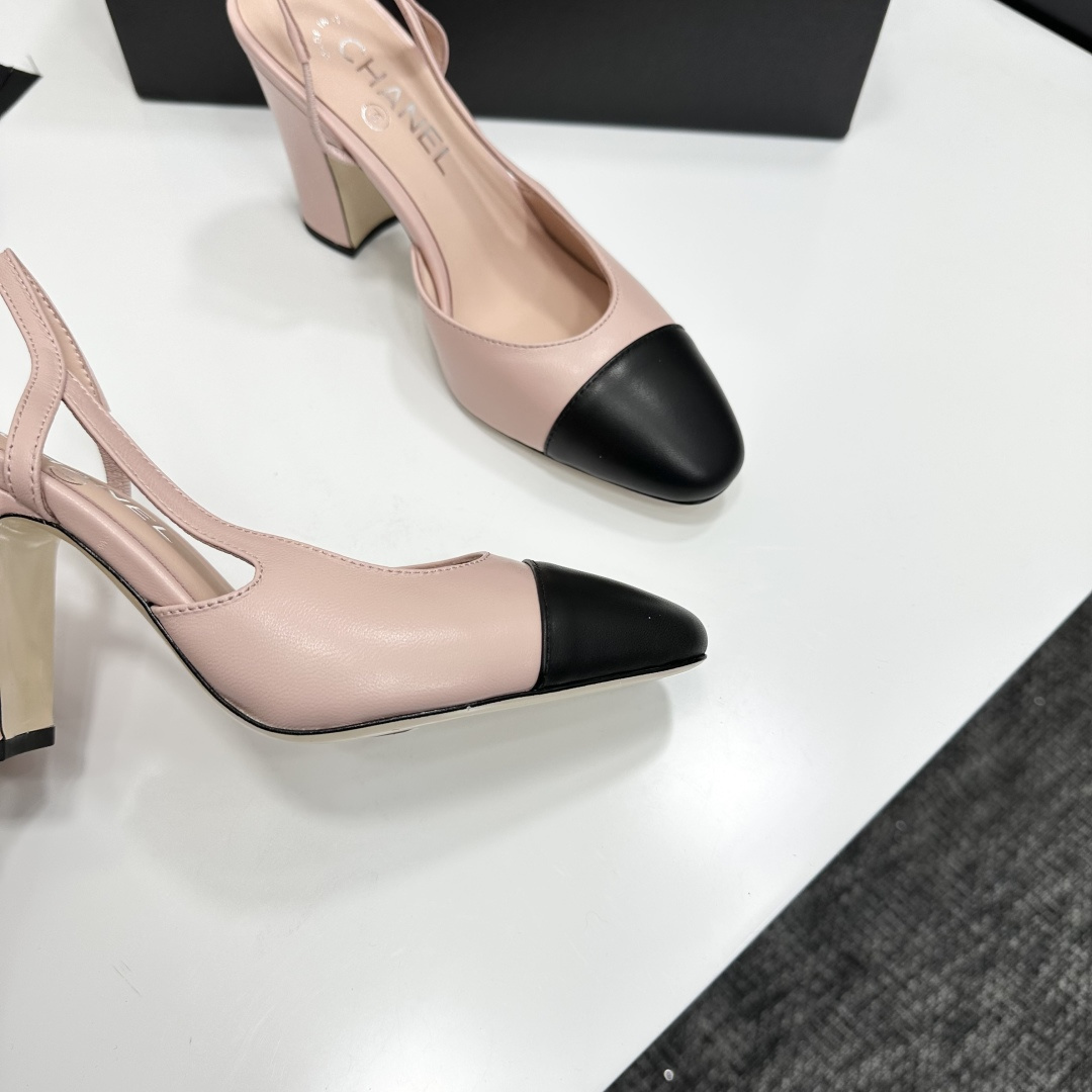 Pair of Chanel two-tone beige and black leather slingback pumps with block heels on a black branded box - Hình 9