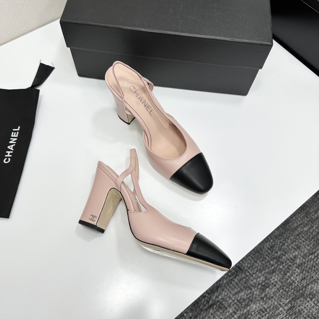 Pair of Chanel two-tone beige and black leather slingback pumps with block heels on a black branded box - Hình 8