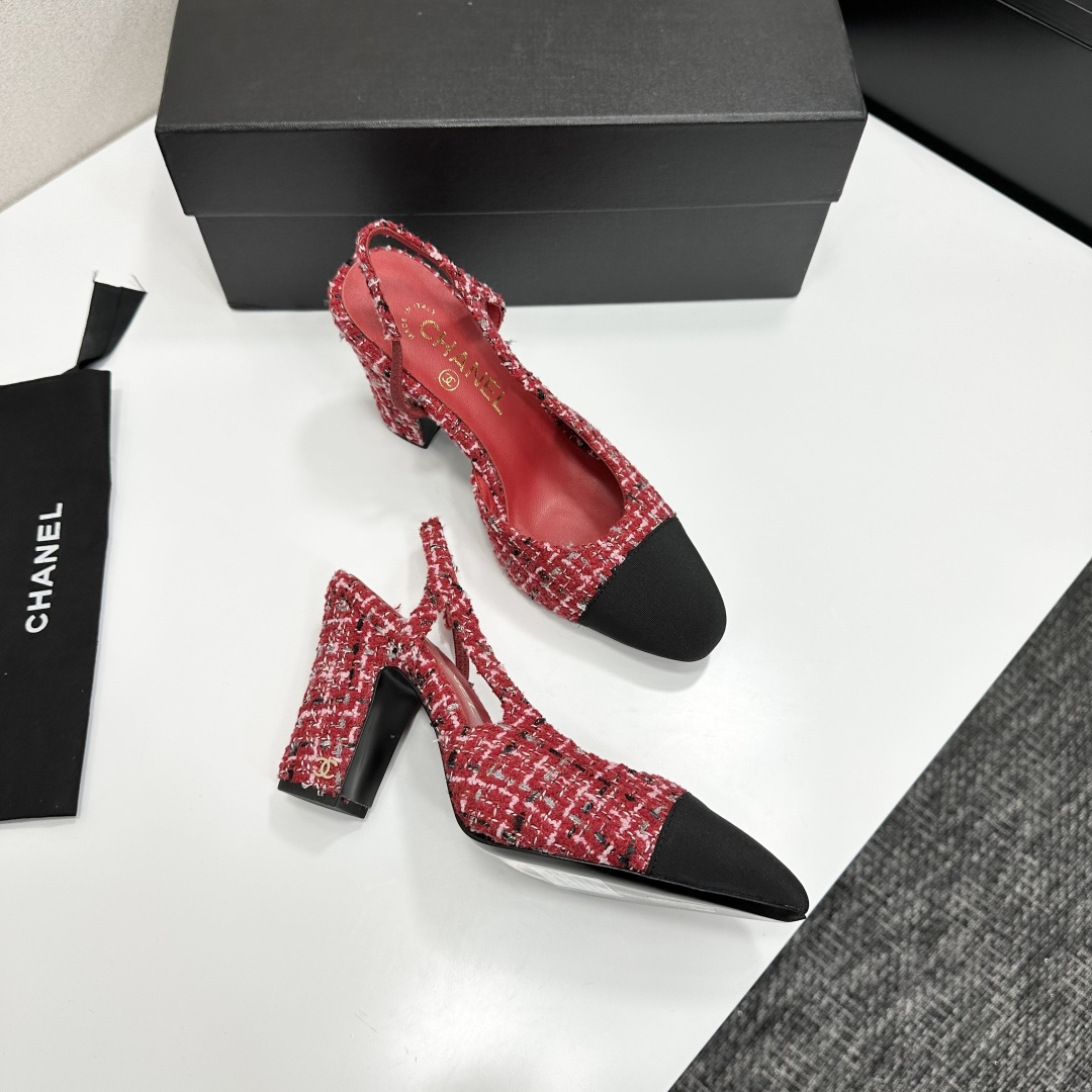 A pair of luxury Chanel red and white tweed slingback heels with black cap toes and chunky block heels displayed on a black branded box. - Hình 10