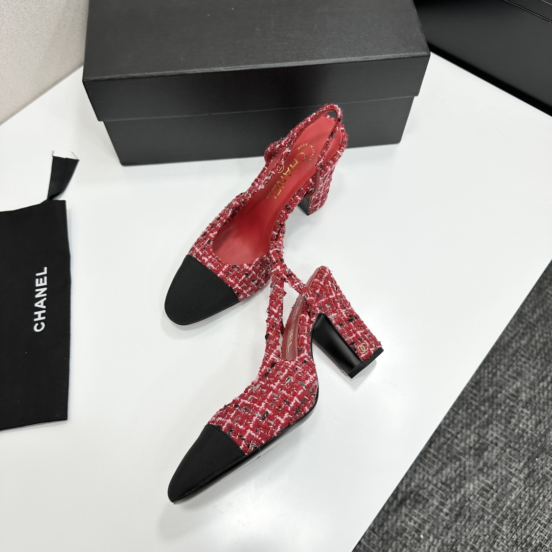 A pair of luxury Chanel red and white tweed slingback heels with black cap toes and chunky block heels displayed on a black branded box. - Hình 7
