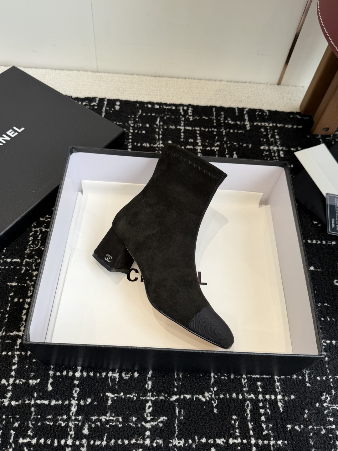 Pair of Chanel black suede ankle boots with CC logo on the block heel and grosgrain toe cap - Hình 6