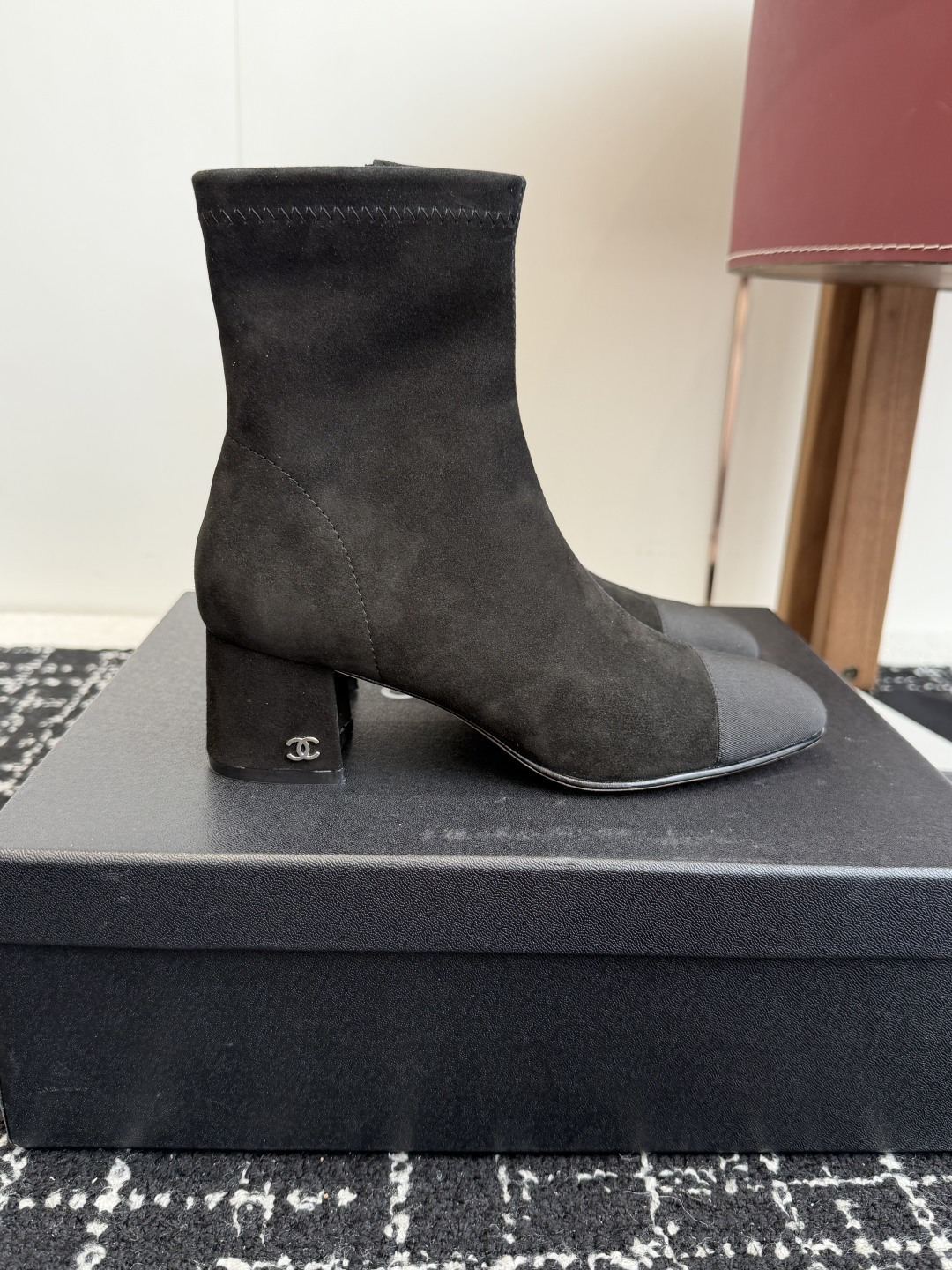 Pair of Chanel black suede ankle boots with CC logo on the block heel and grosgrain toe cap - Hình 2