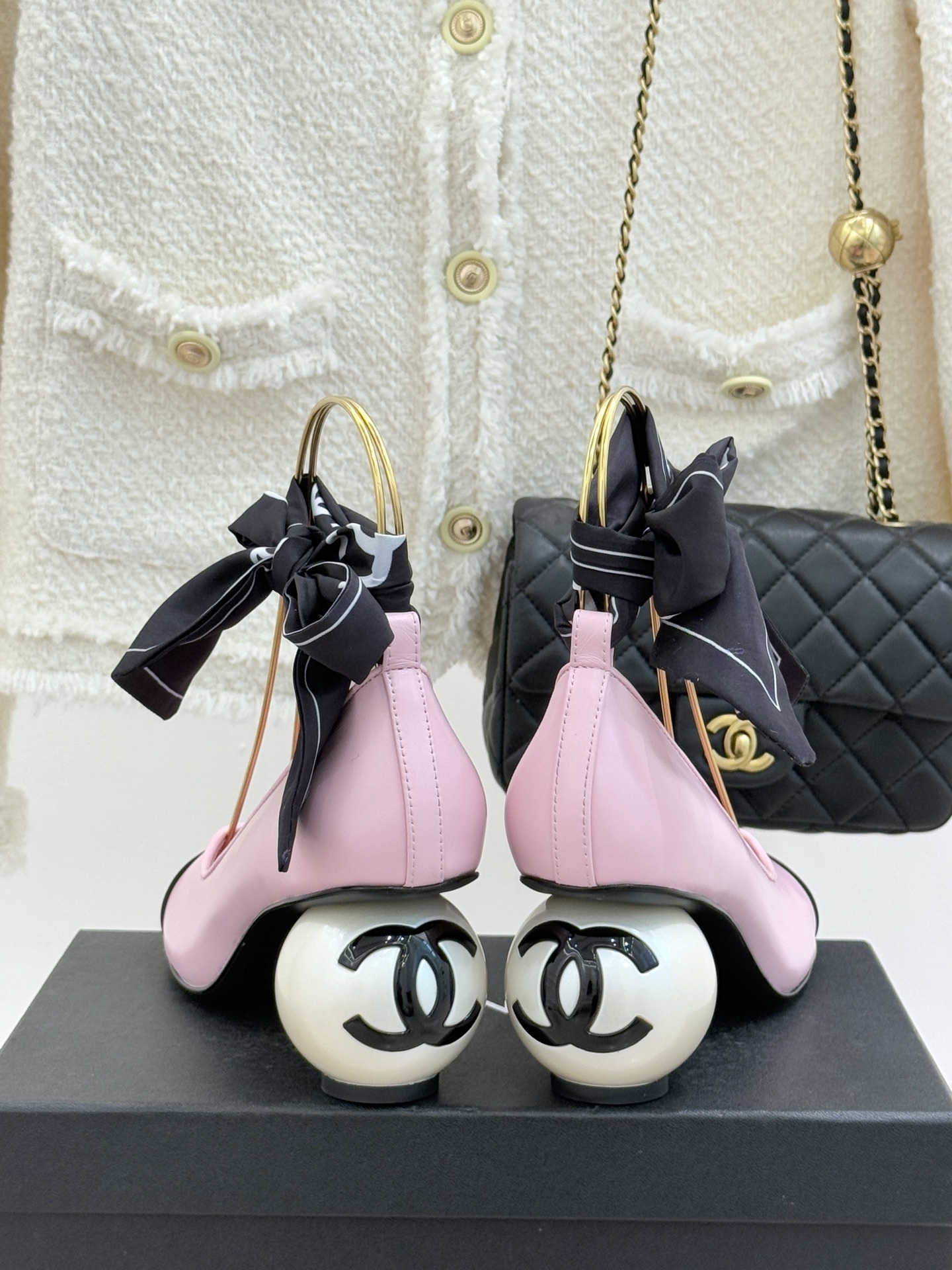 Luxury Chanel pink leather pumps with black cap toe, unique white pearl heel, and black silk scarf bow detail. - Hình 6