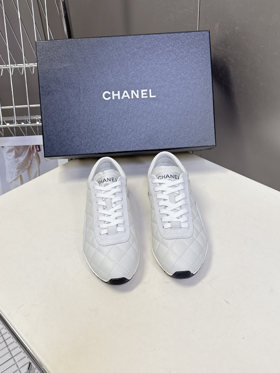 Chanel Women’s White Quilted Leather Sneakers – Luxury Designer Shoes
