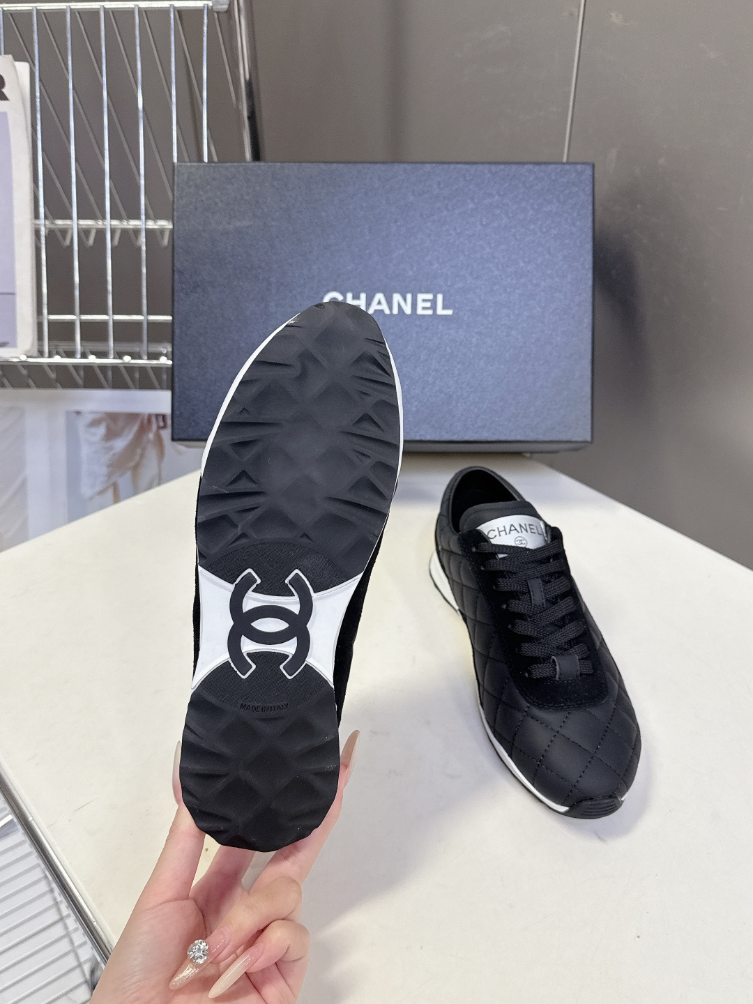 Pair of black Chanel quilted sneakers with white CC logo and original designer box - Hình 9