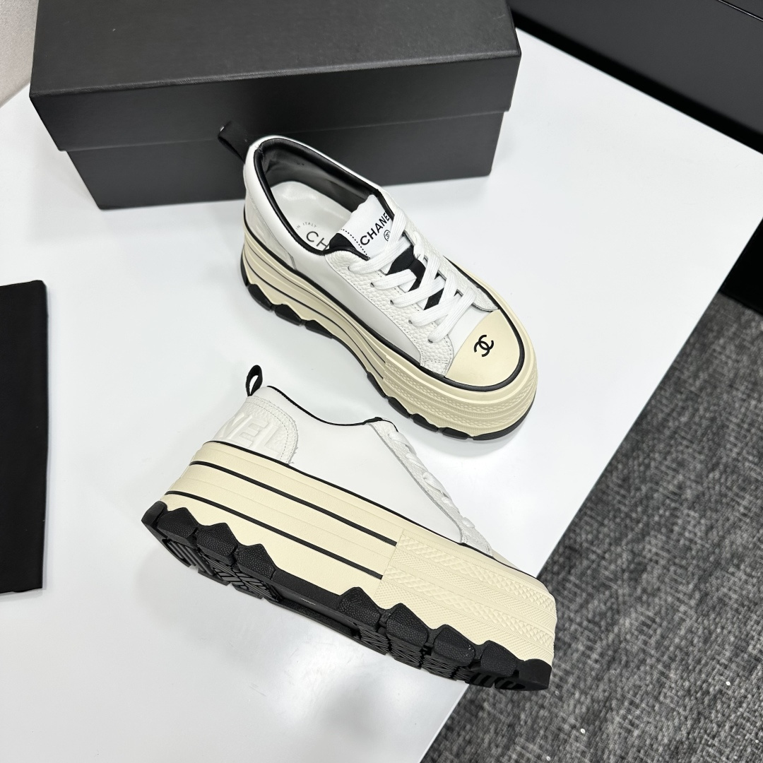 Pair of Chanel white leather platform sneakers with multi-layered soles and black CC logo details - Hình 7