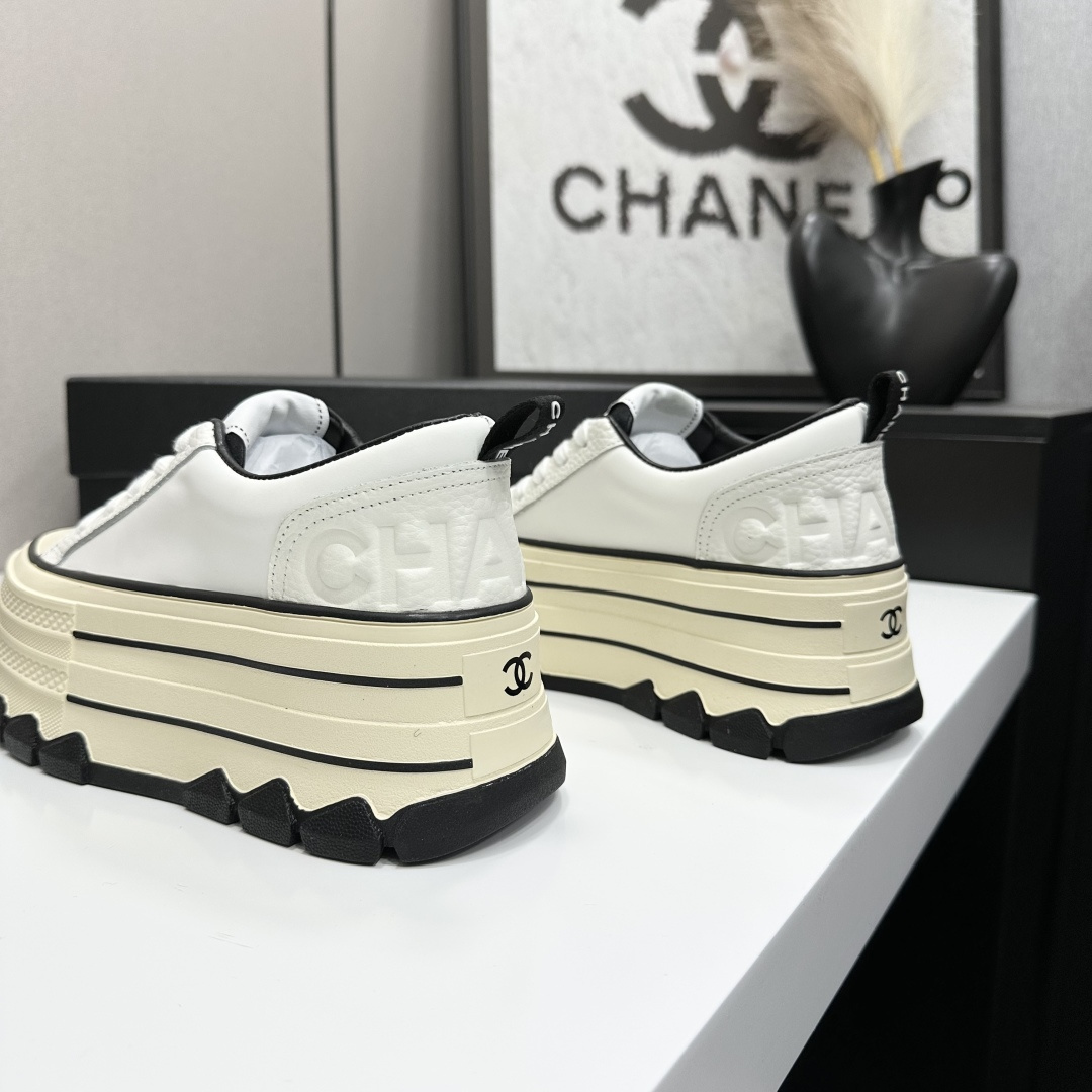 Pair of Chanel white leather platform sneakers with multi-layered soles and black CC logo details - Hình 6