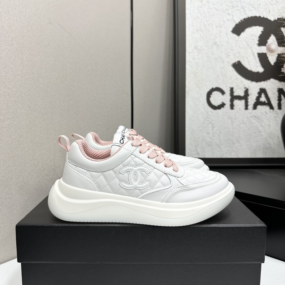 Chanel Luxury White Quilted Sneakers with Pink Accents