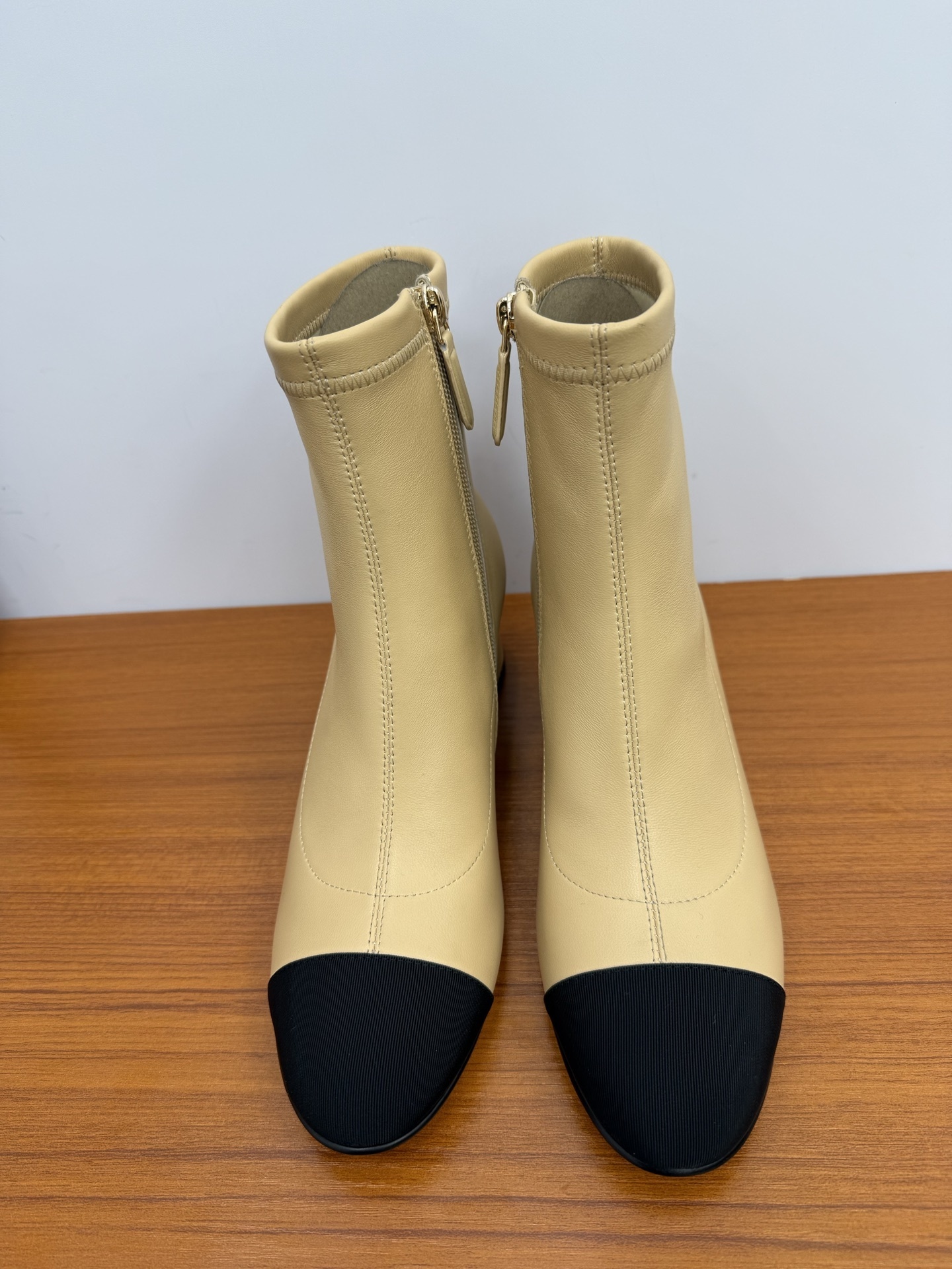 Chic Beige Leather Ankle Boots with Black Cap Toe & Block Heel